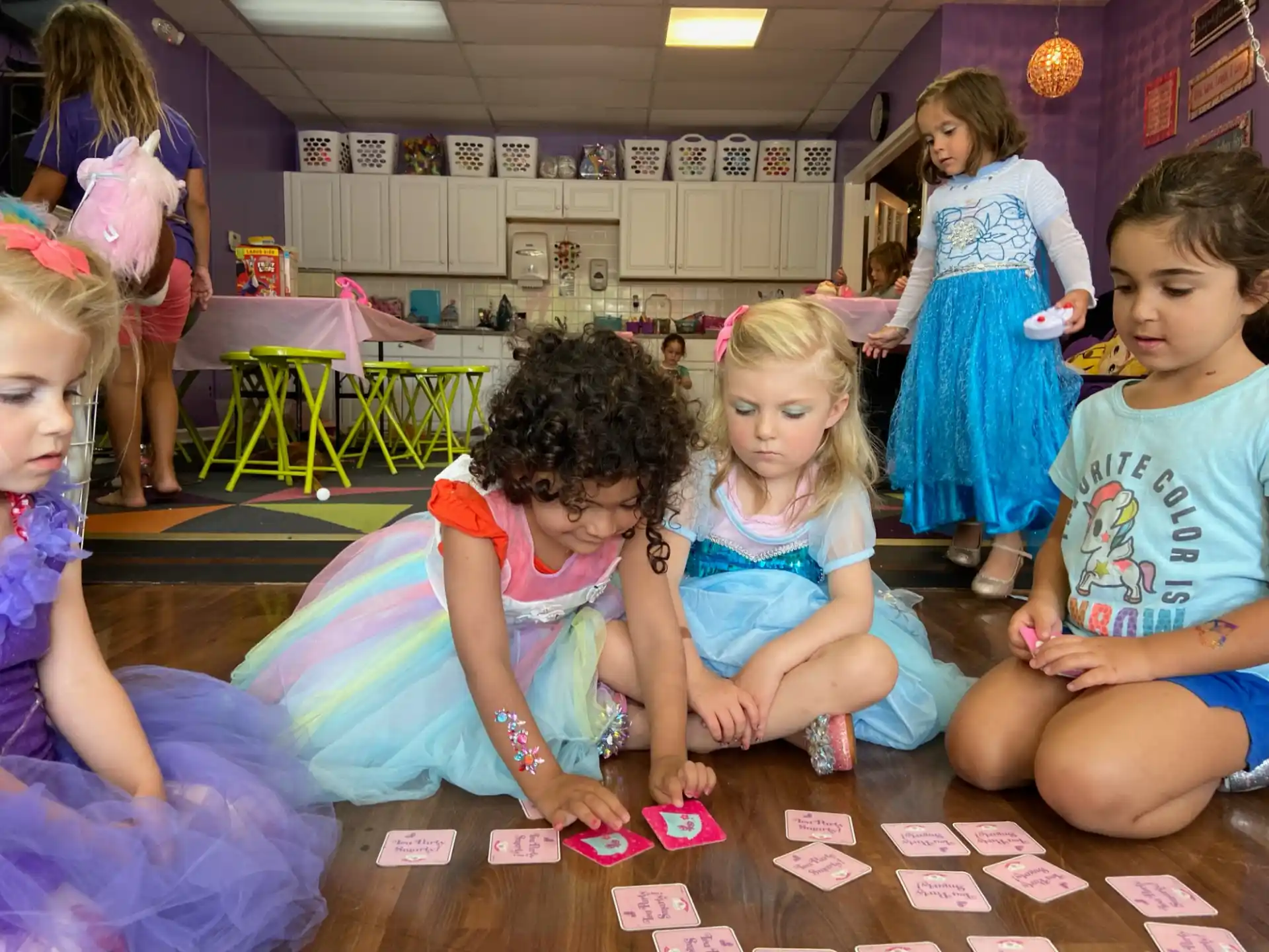 a group of children sitting on the floor