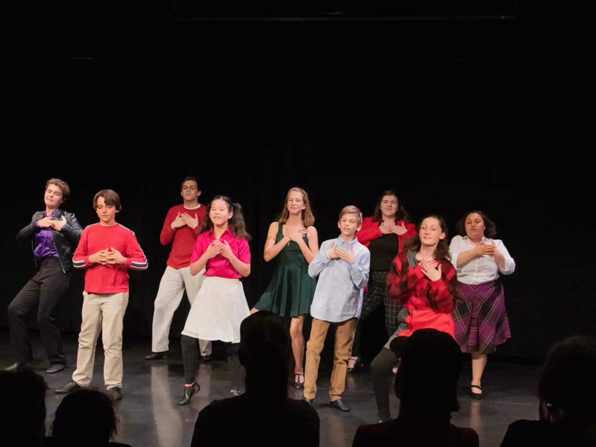 a group of people on a stage