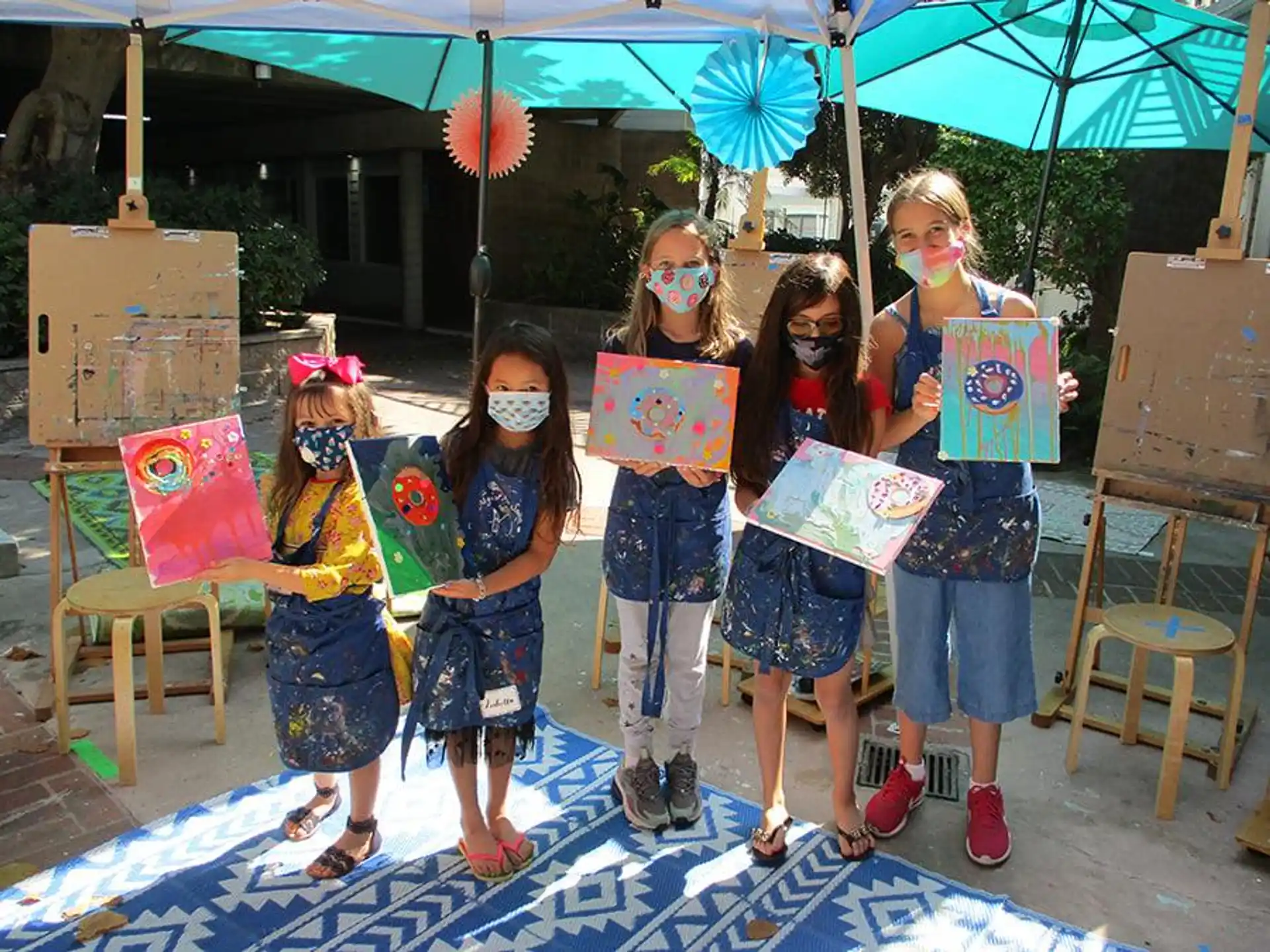 a group of children holding signs