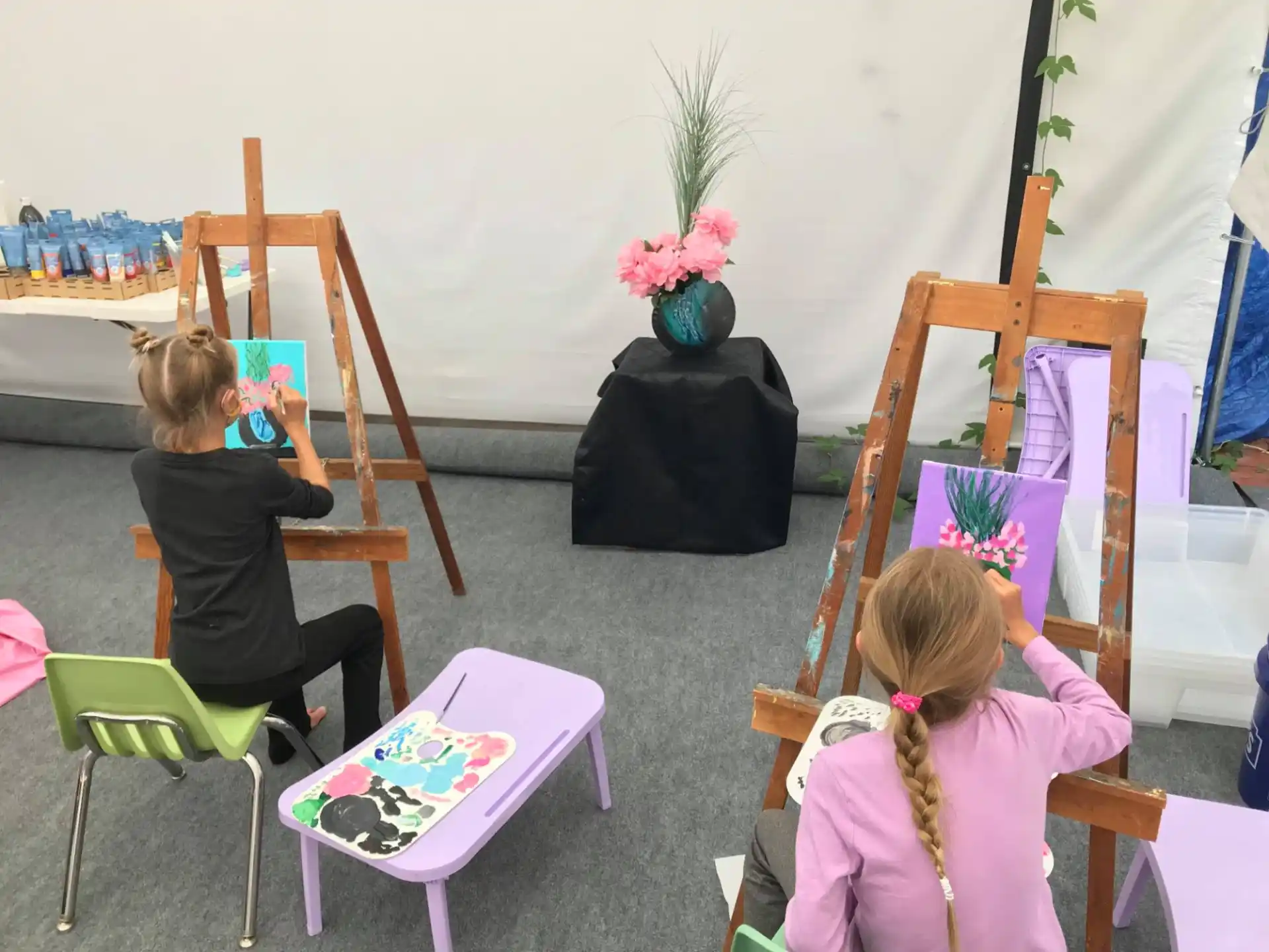 a couple of girls painting