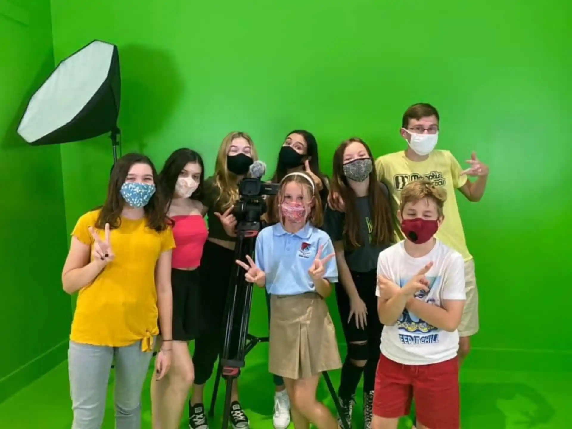 a group of people posing for a photo