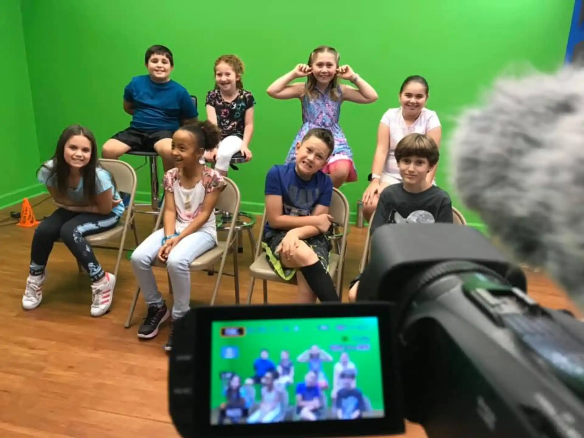 a group of people sitting in chairs