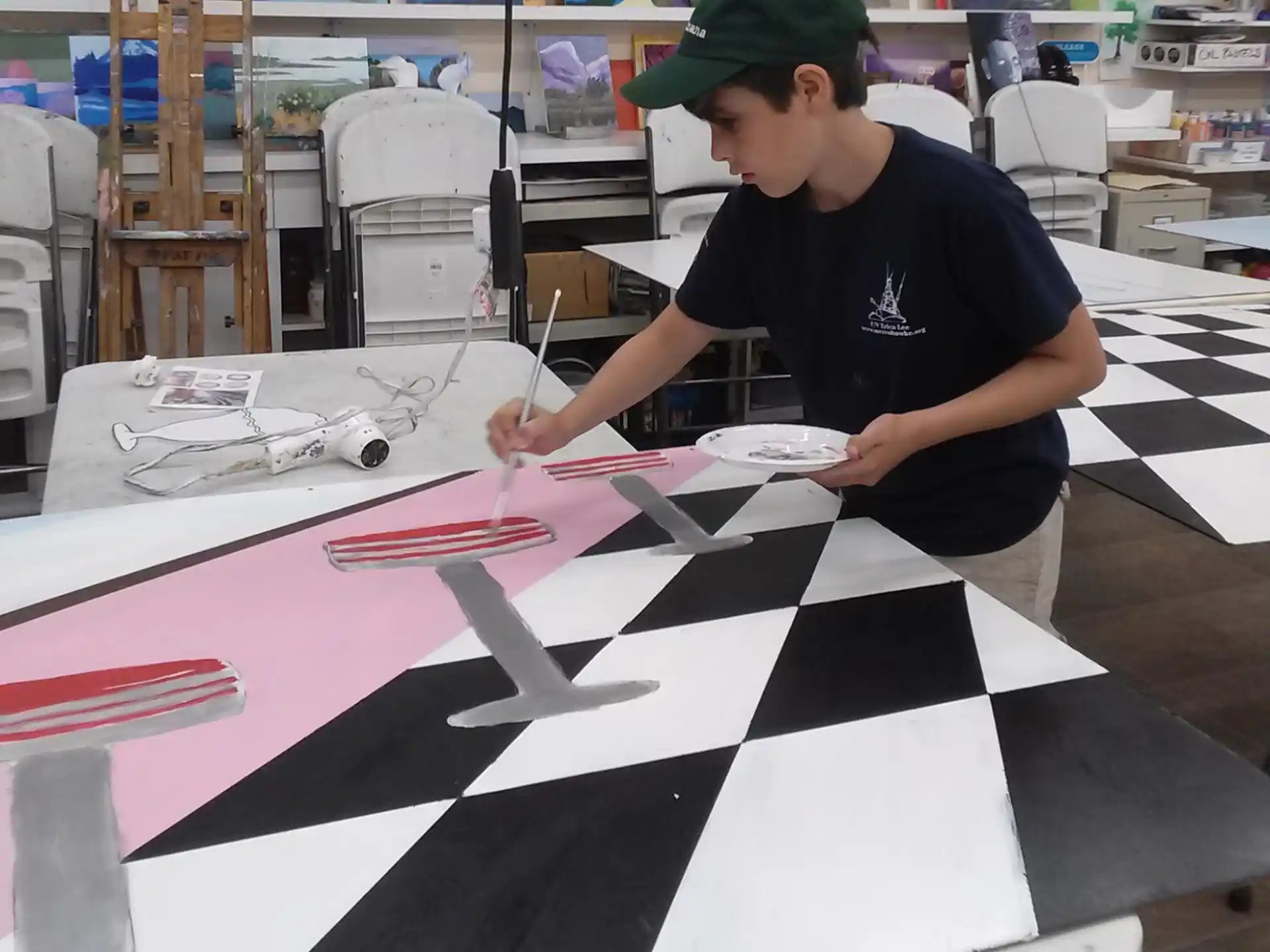 a person painting a table
