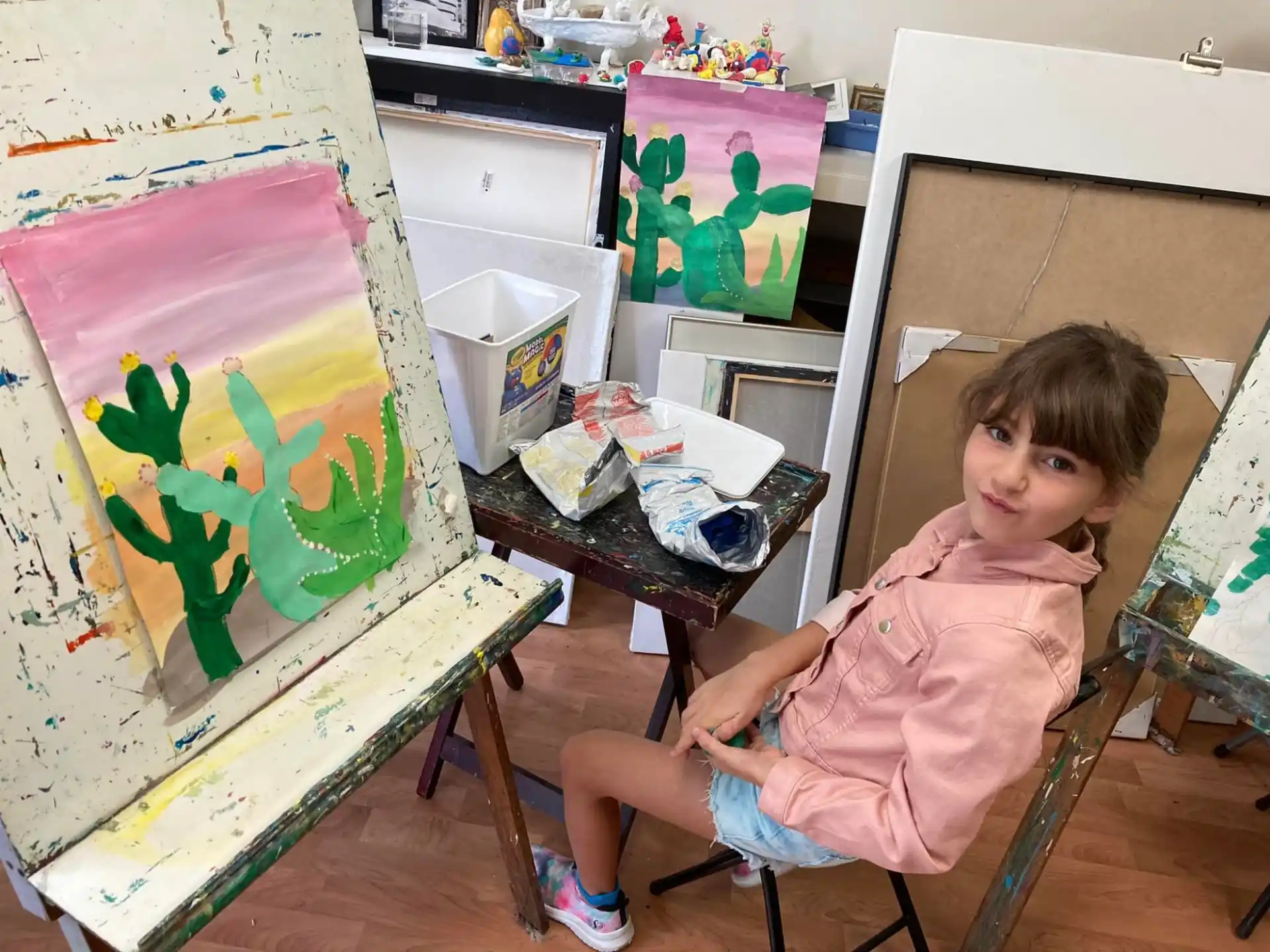 a young girl sitting on a chair
