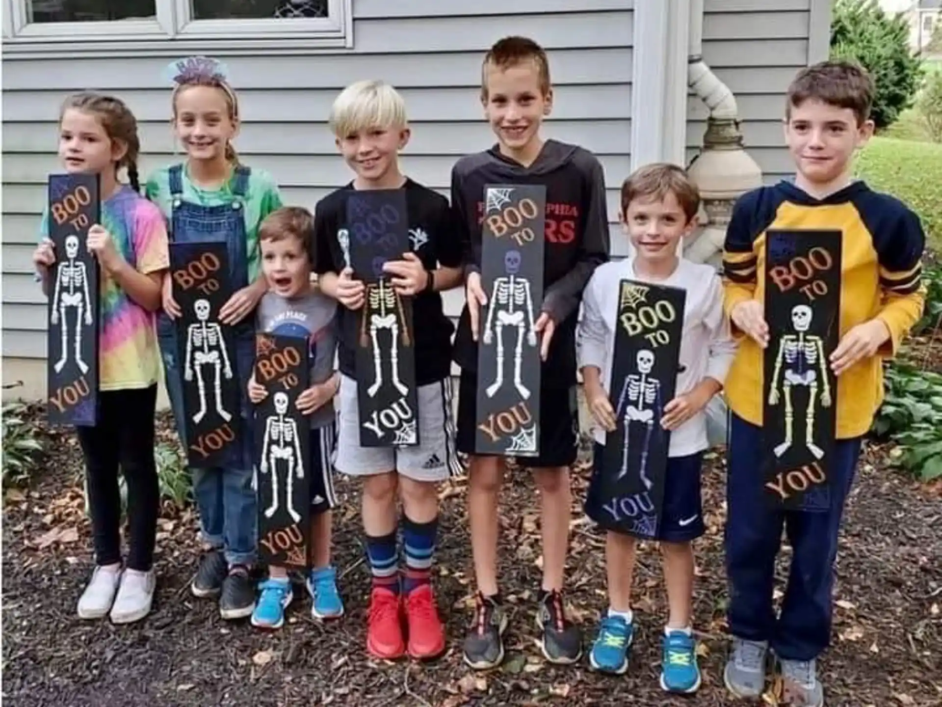 a group of children posing for a photo