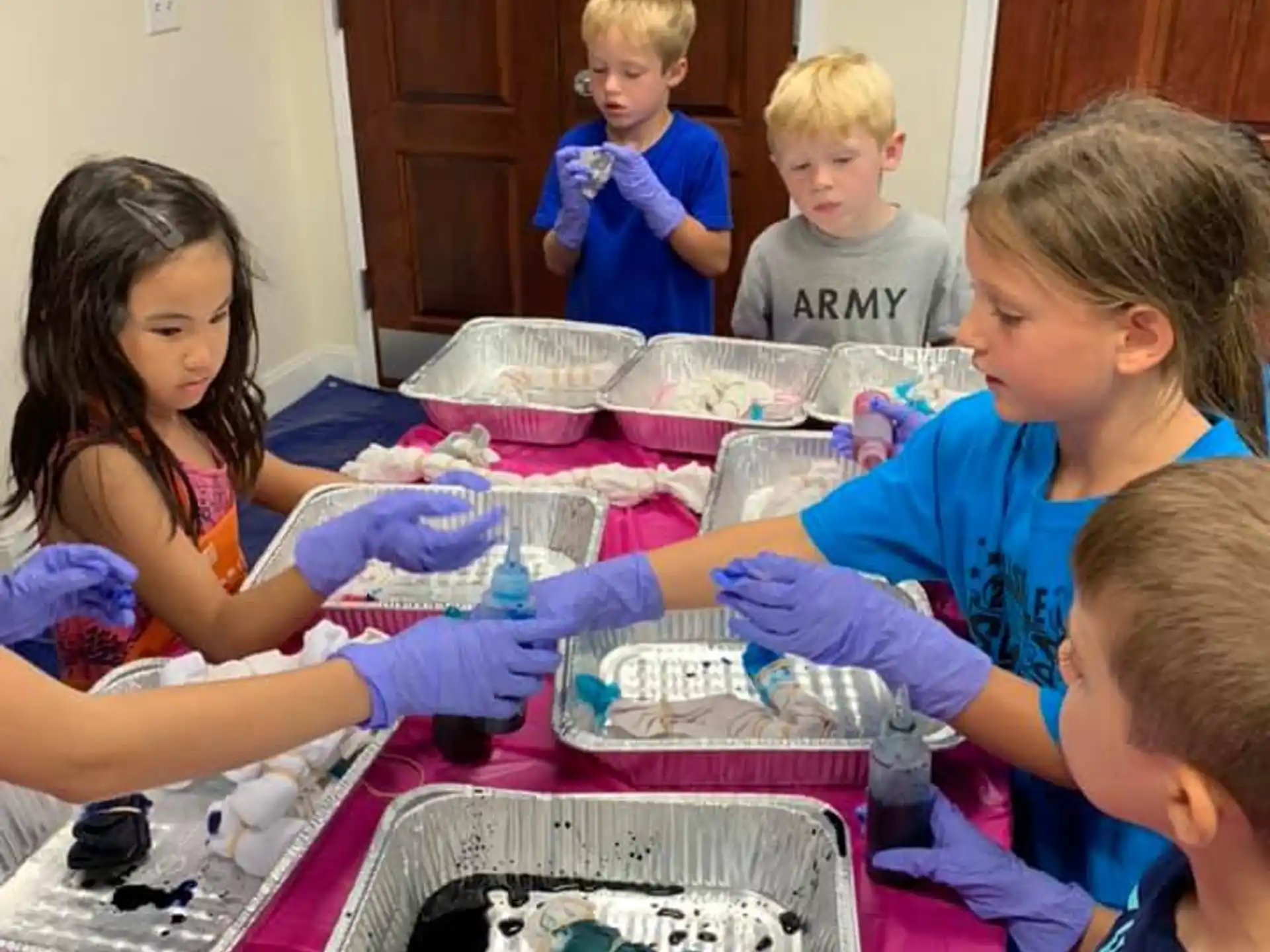 a group of children playing with toys