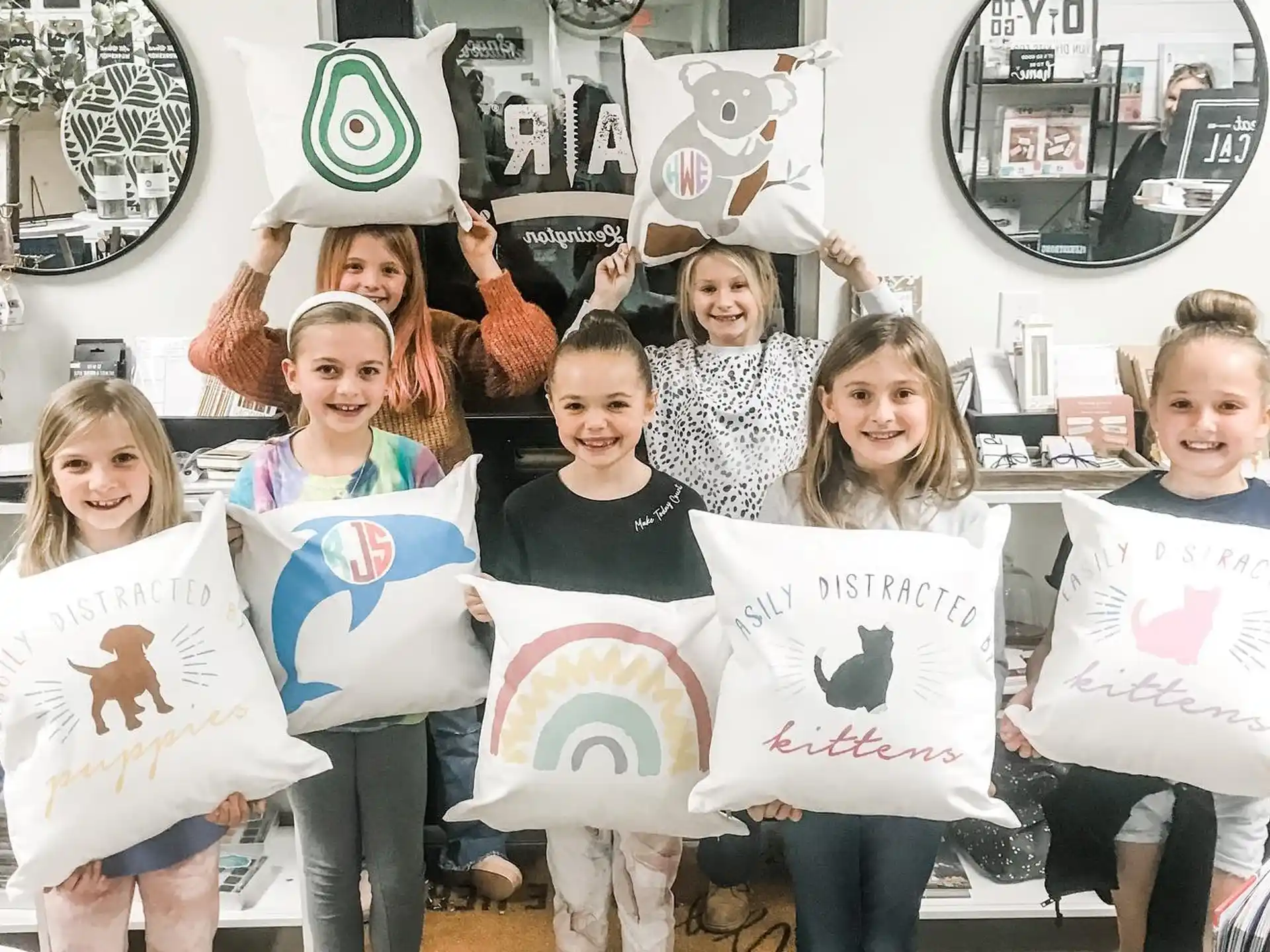 a group of children holding signs