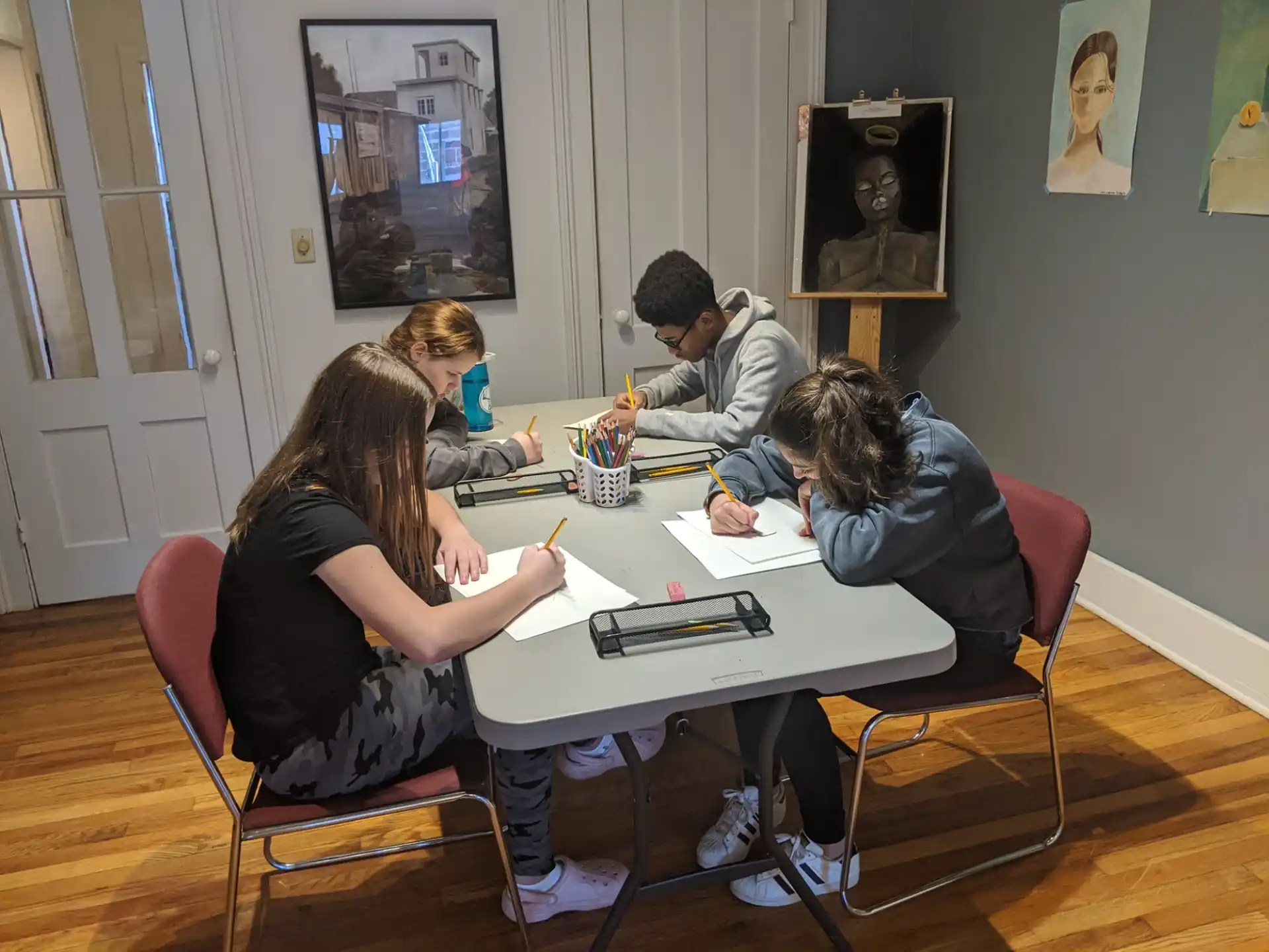 a group of people sitting around a table
