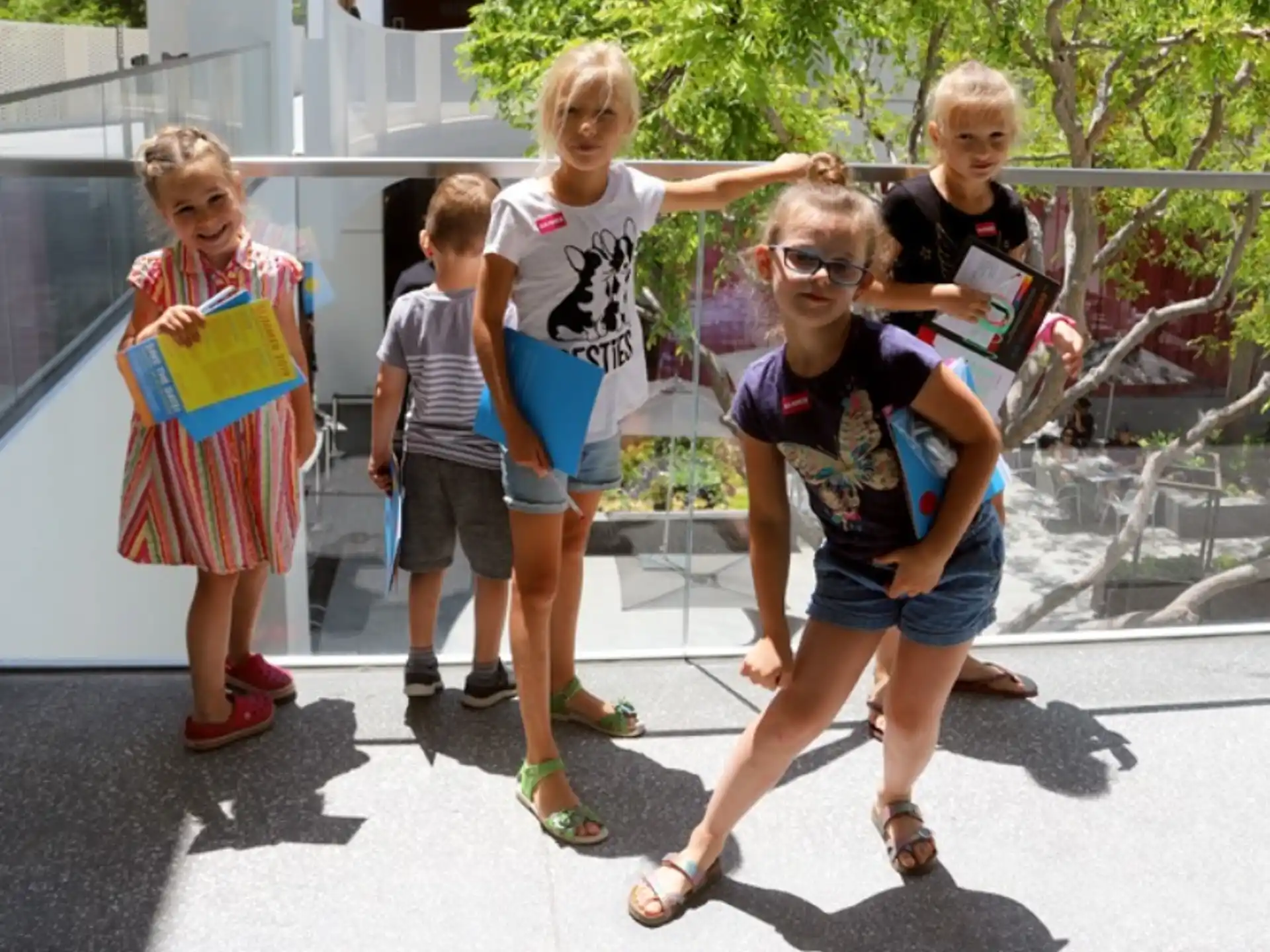 a group of children holding flags