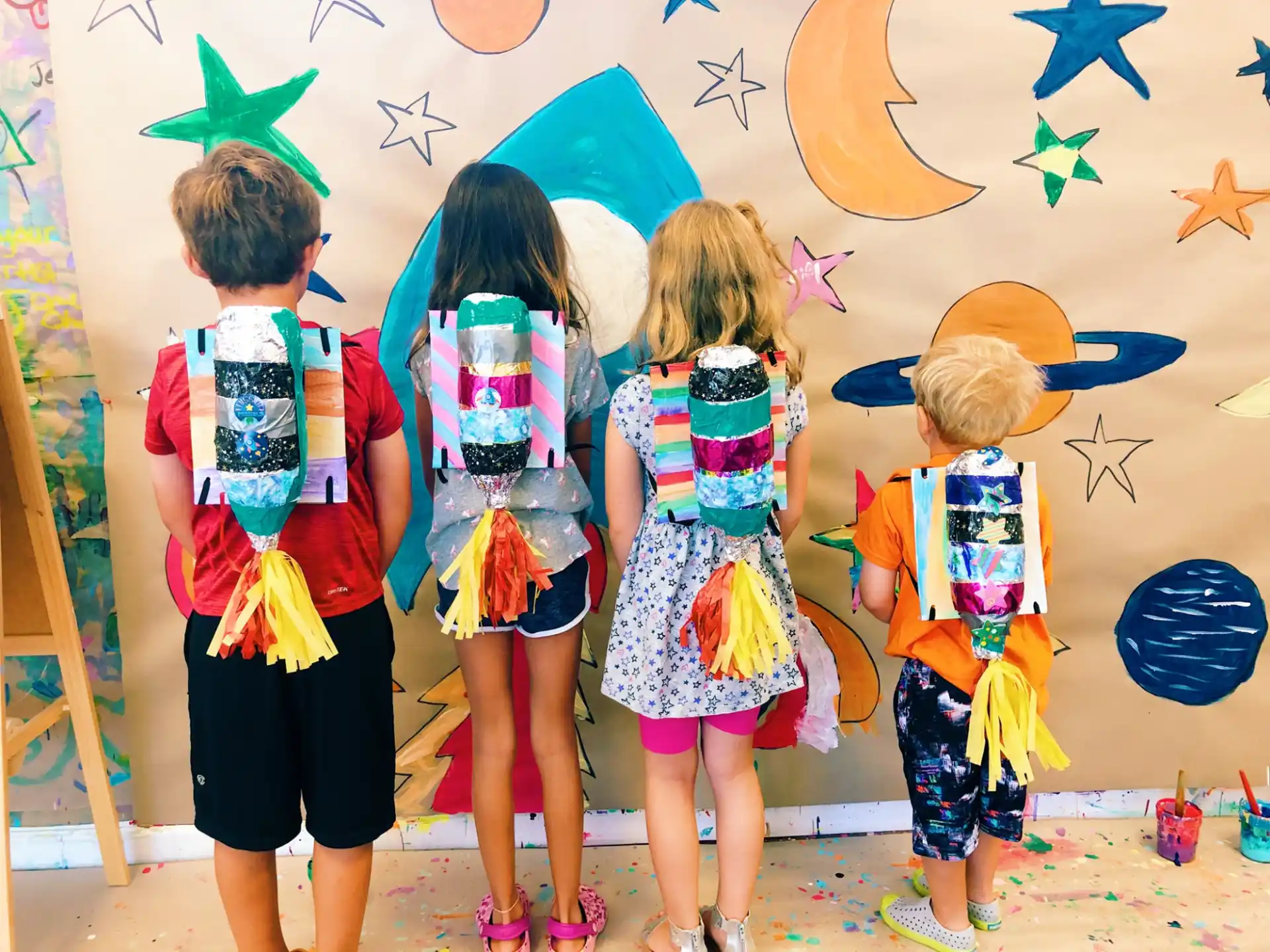 a group of children in clothing
