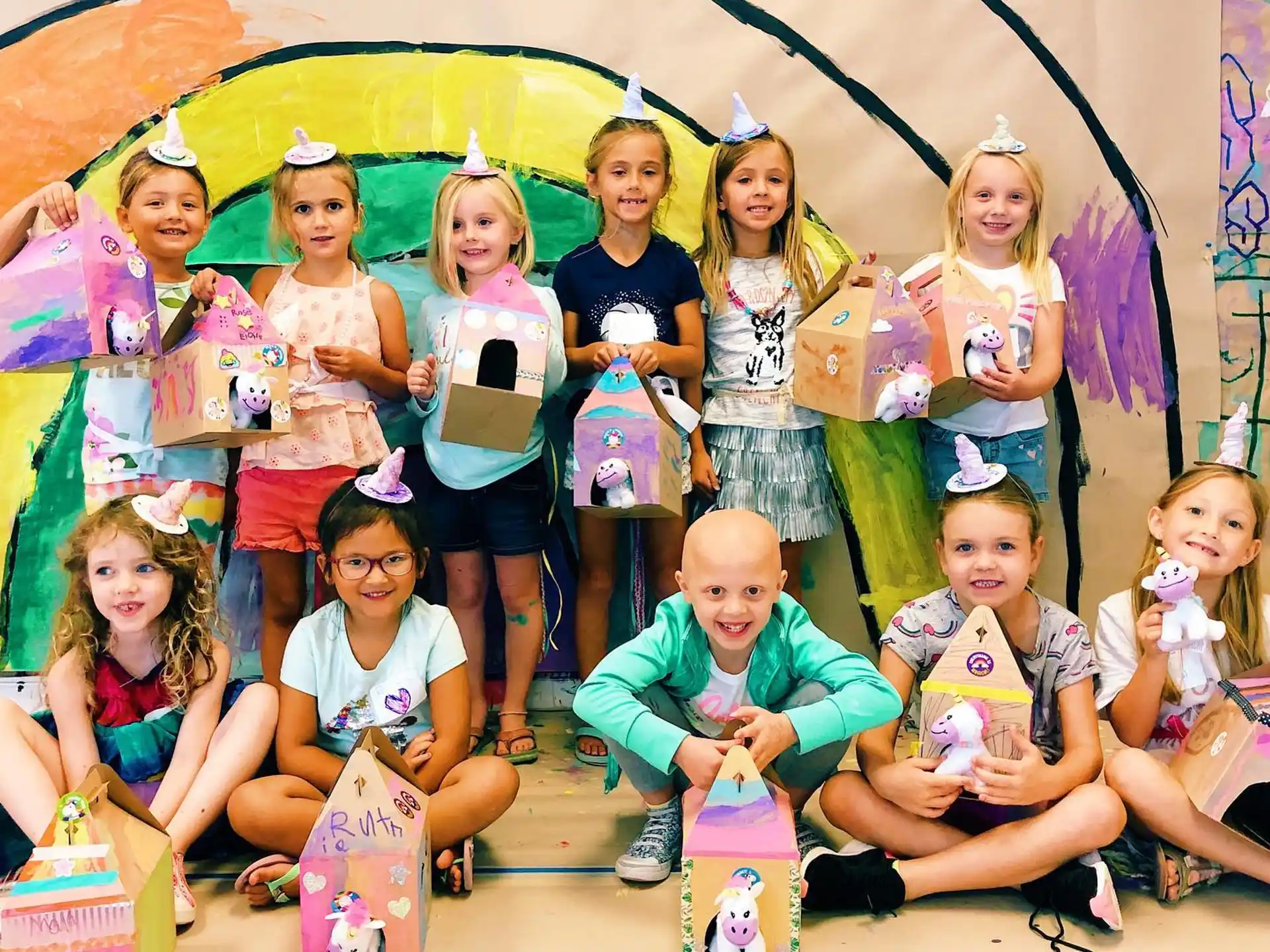a group of children posing for a photo