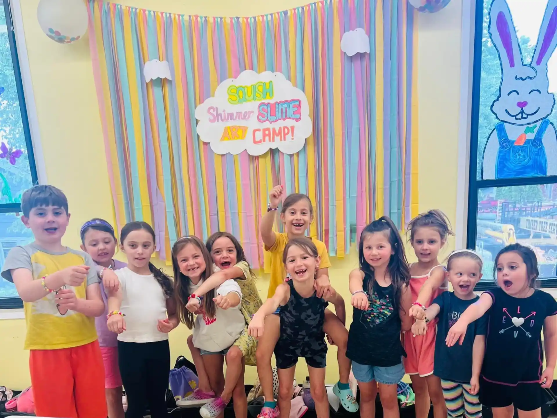 a group of children posing for a photo