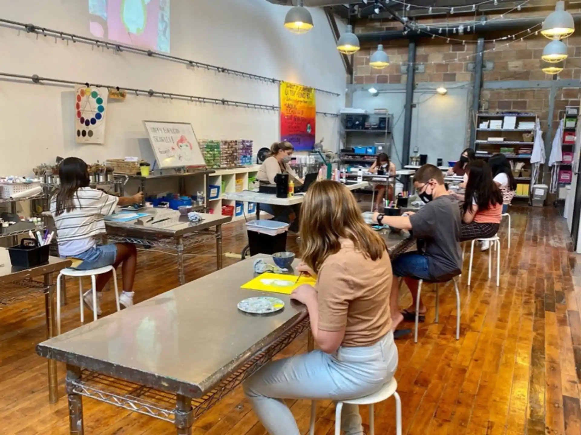 a group of people sitting at tables