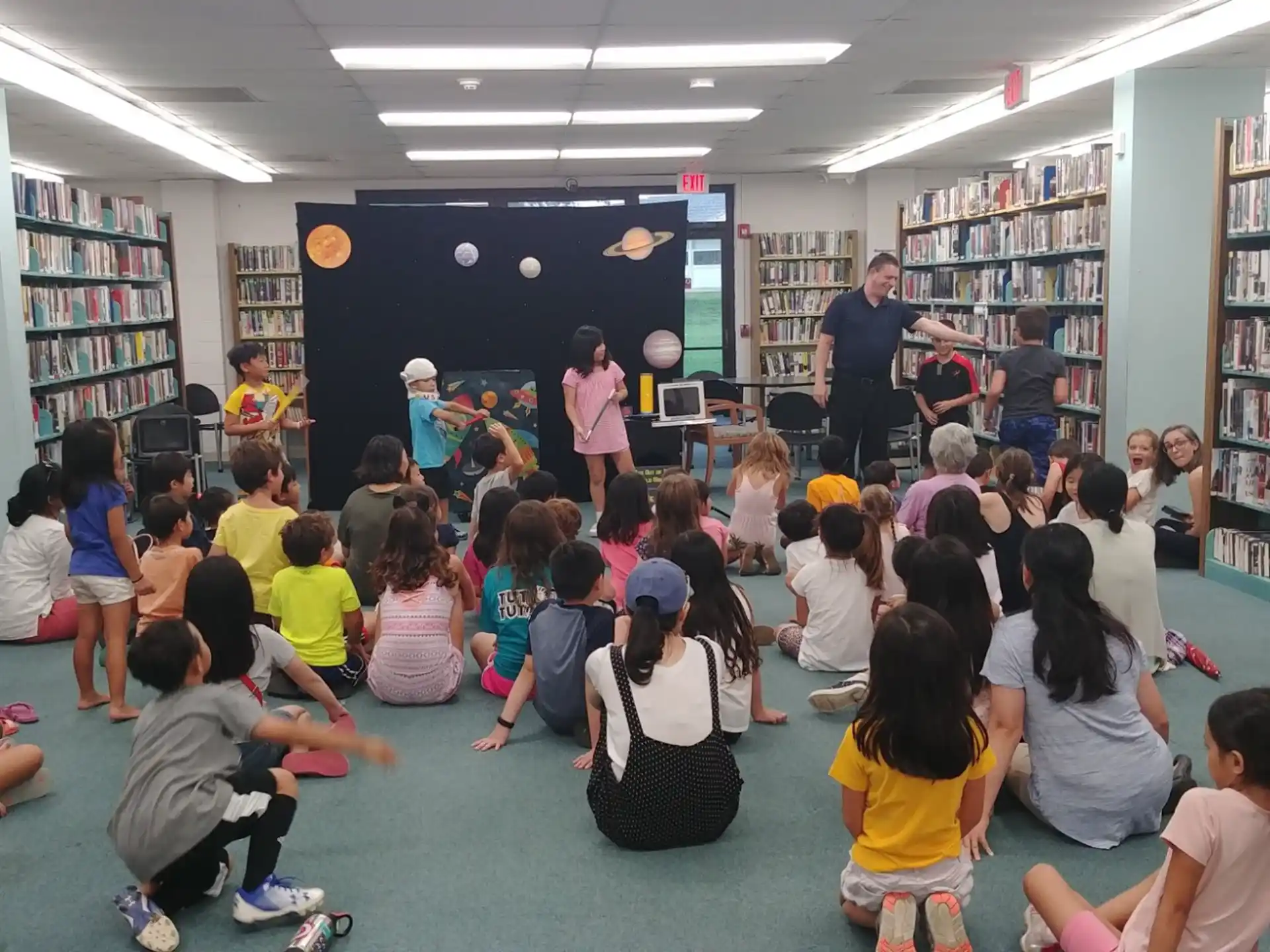 a group of children in a library