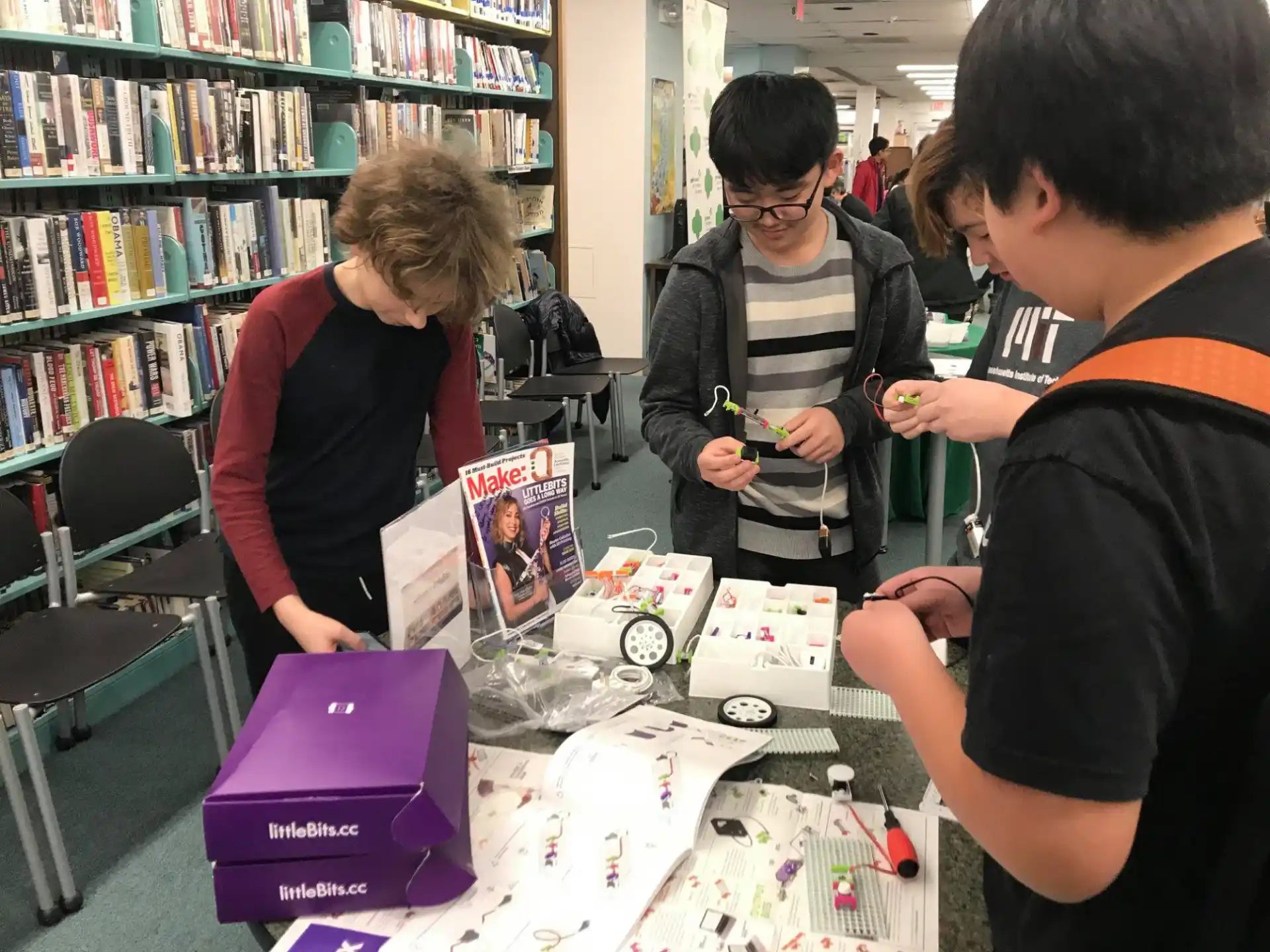 a group of people playing a board game