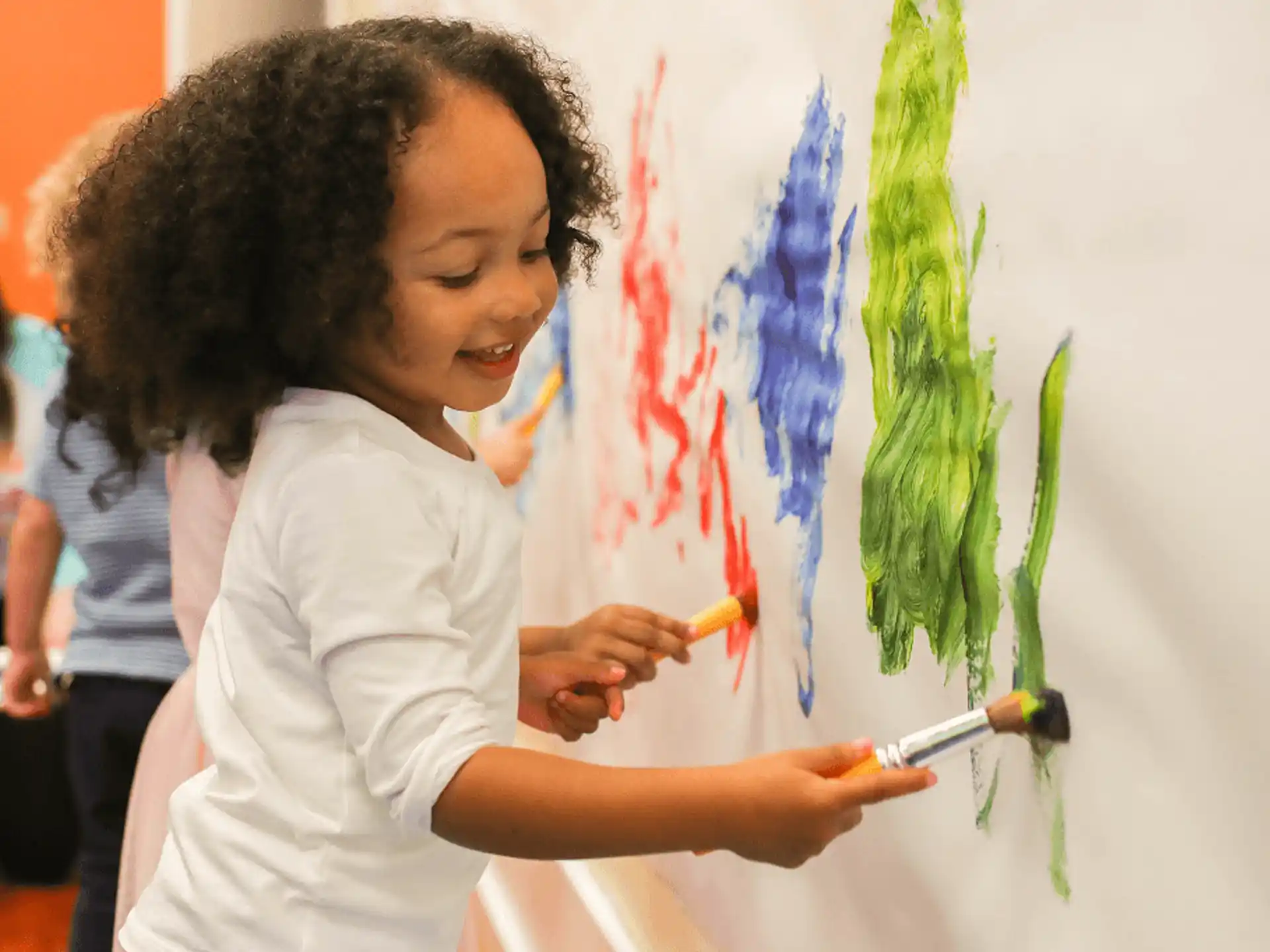 a man painting a picture
