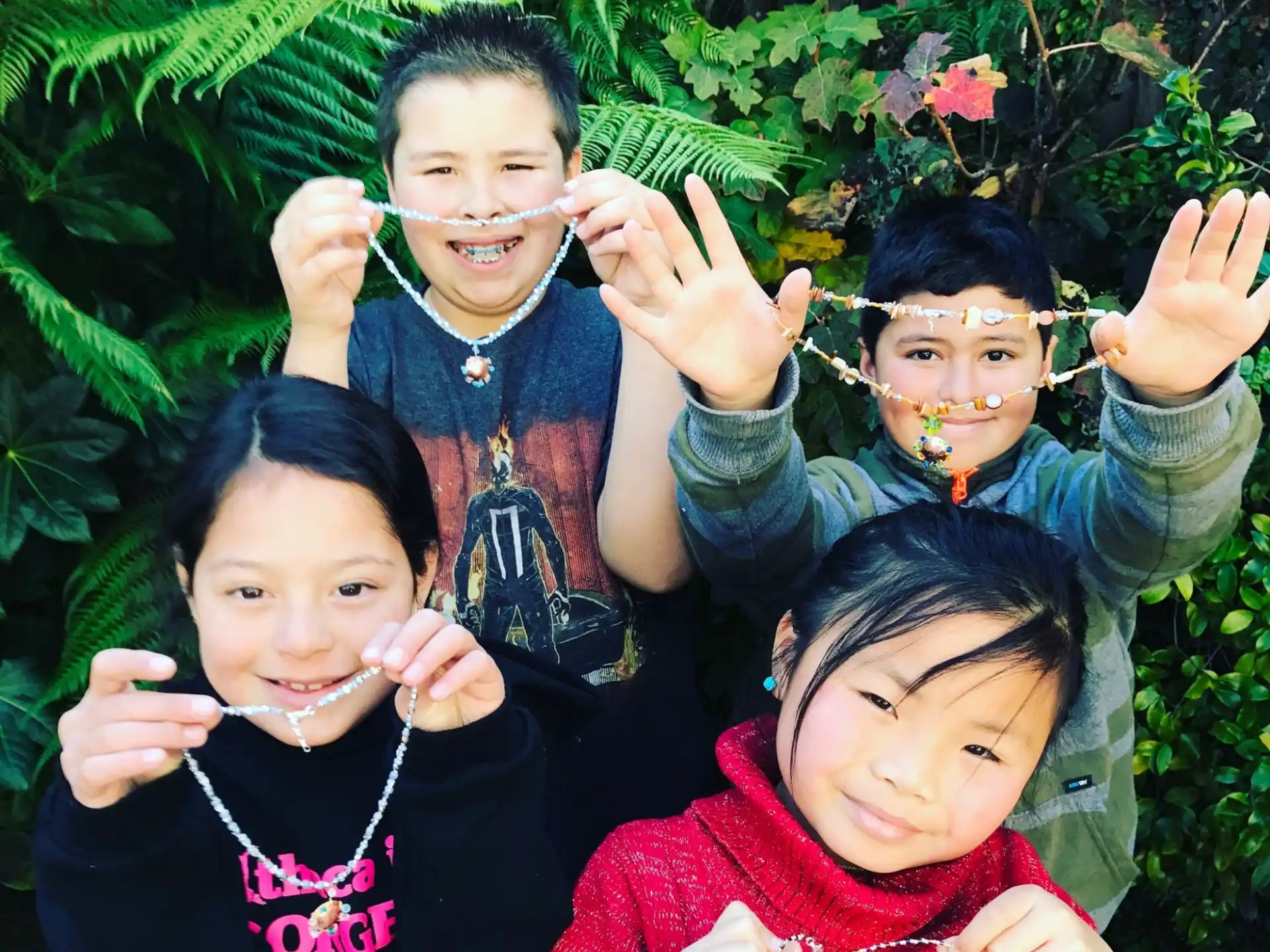 a group of children posing for a photo
