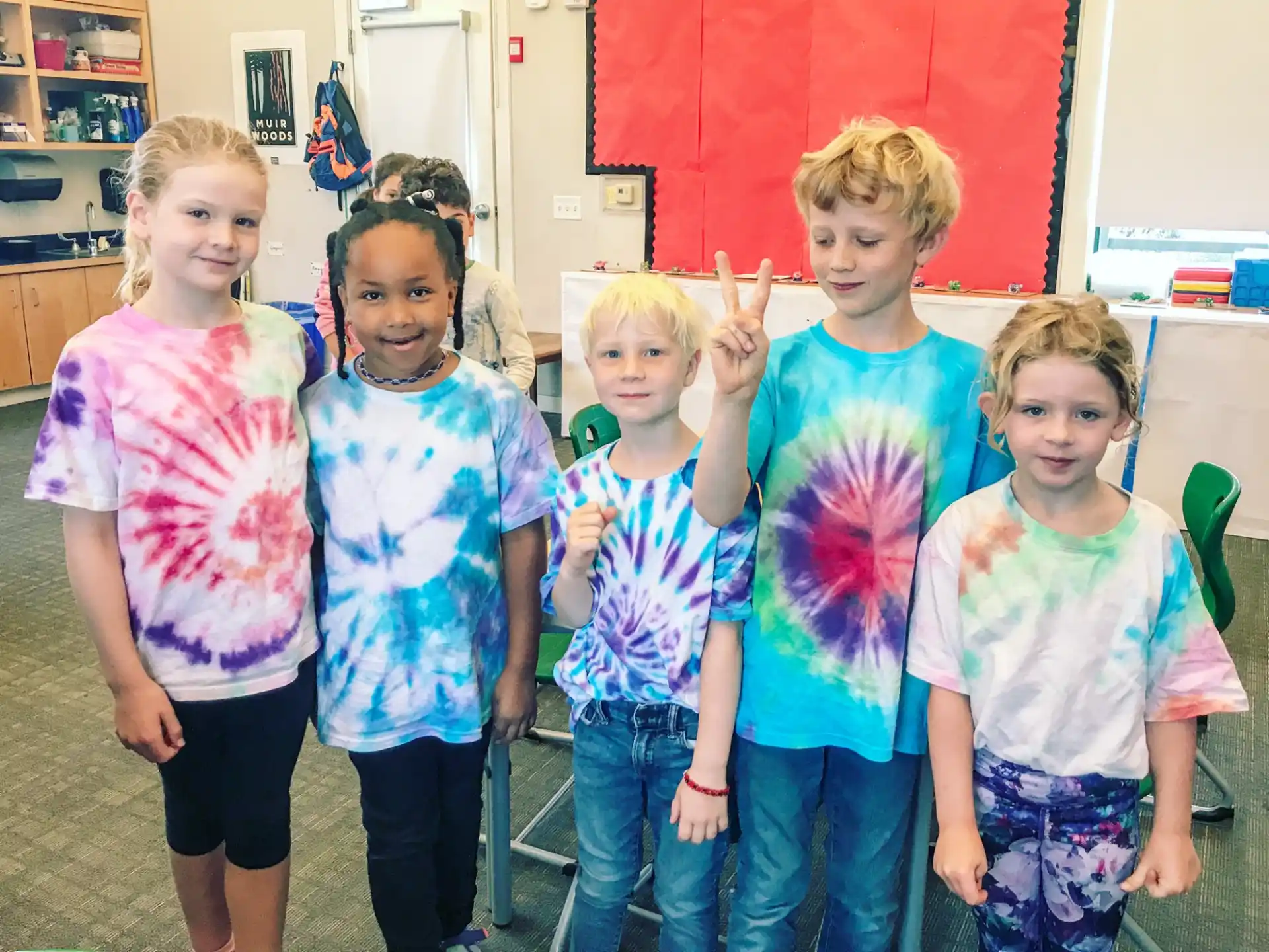 a group of children posing for a photo