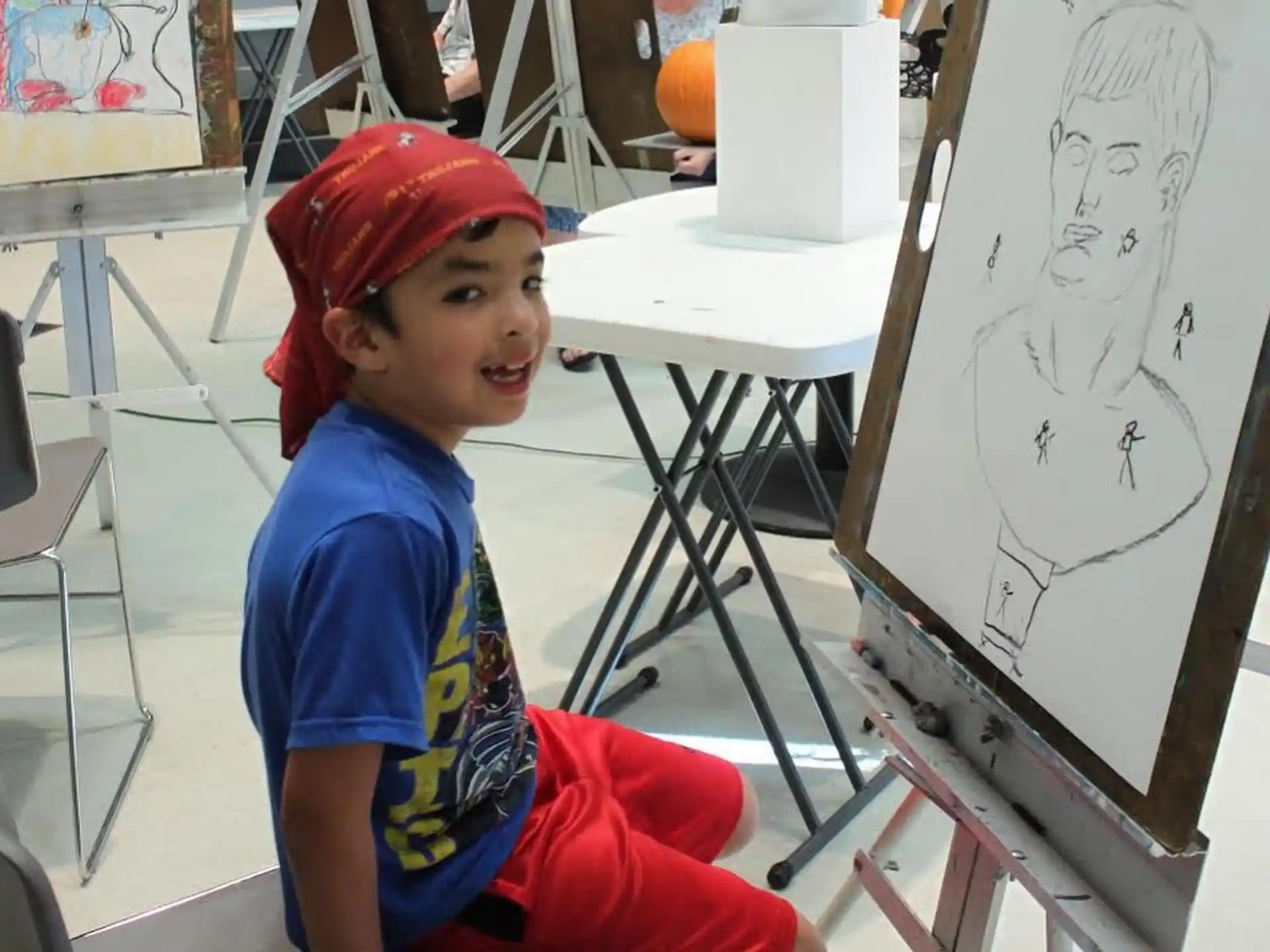 a boy sitting on a chair