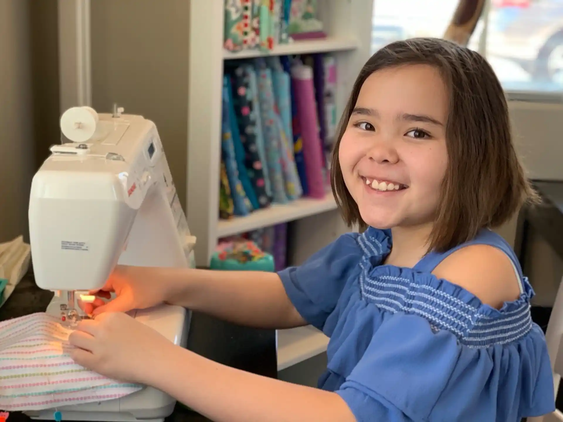 a young girl smiling