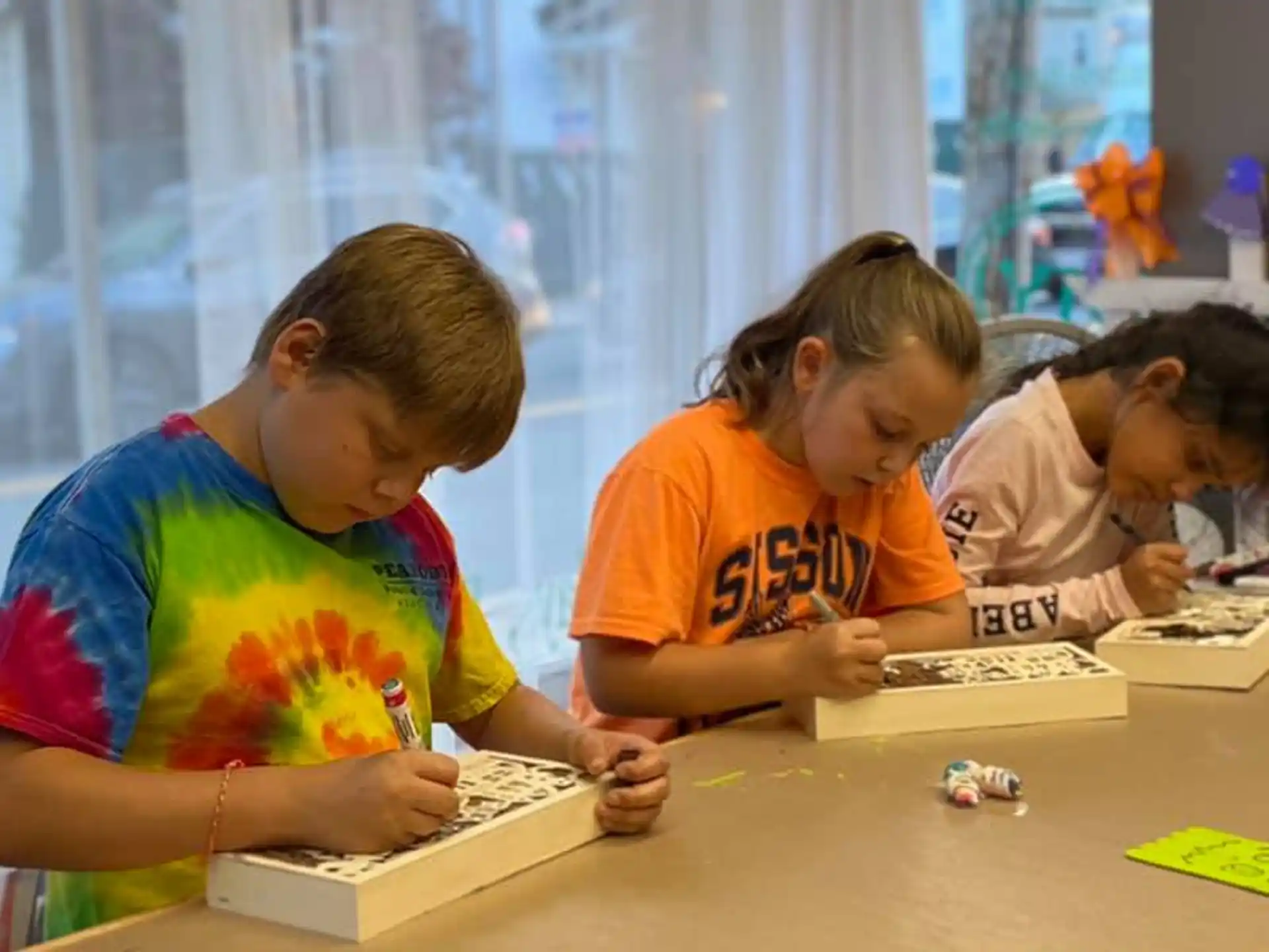 a few young girls playing a game