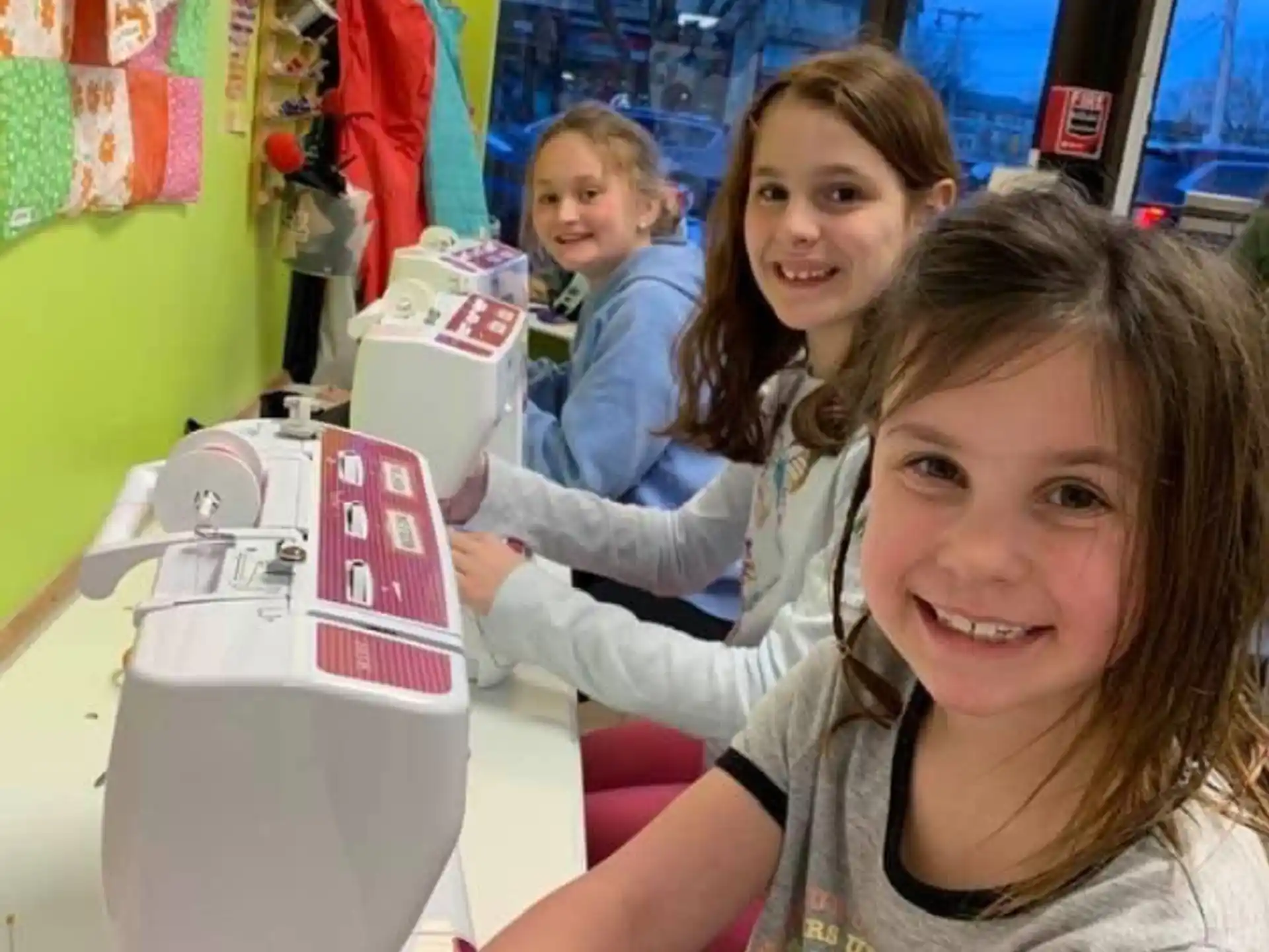 a group of girls smiling