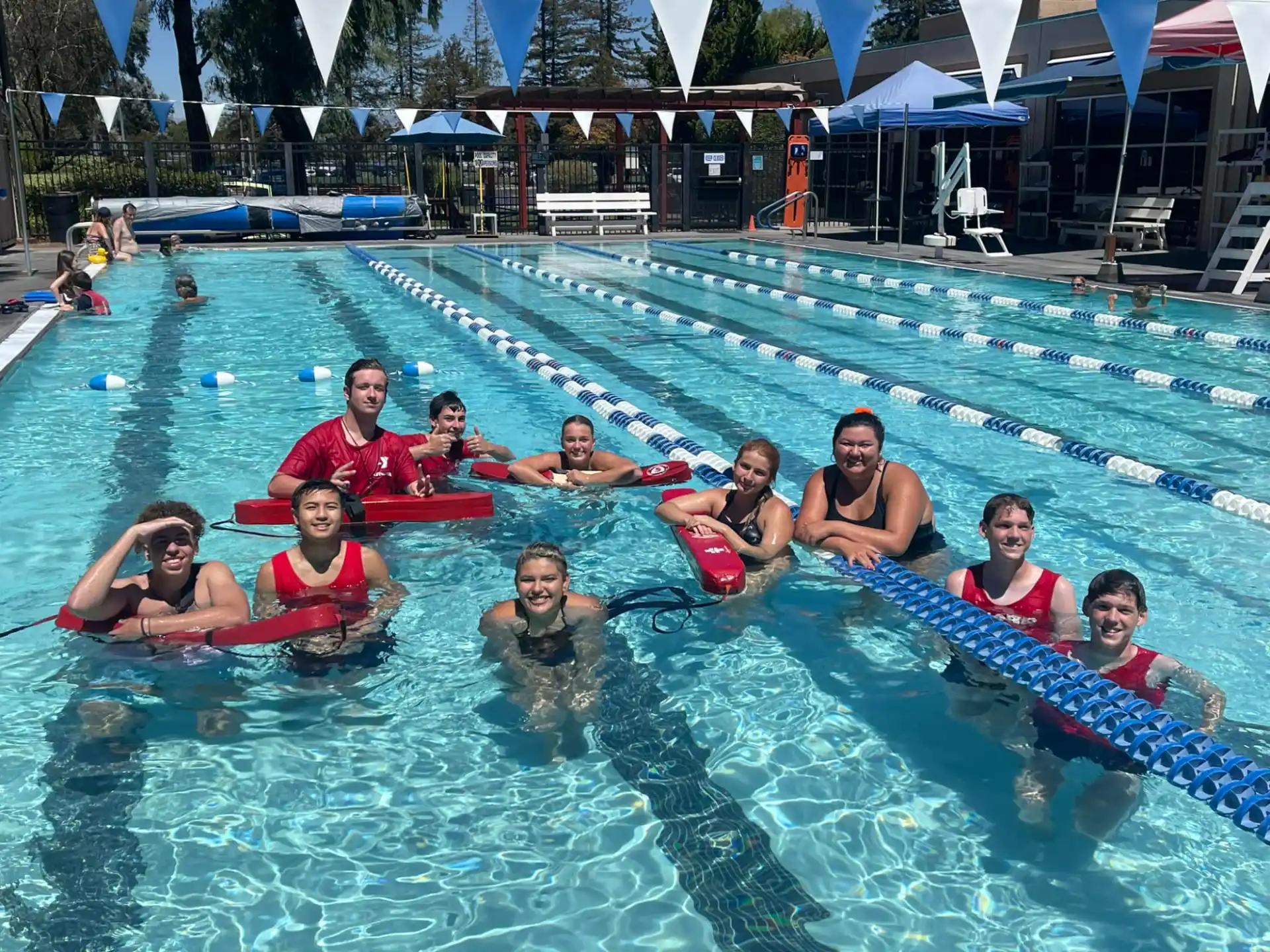 a group of people in a pool