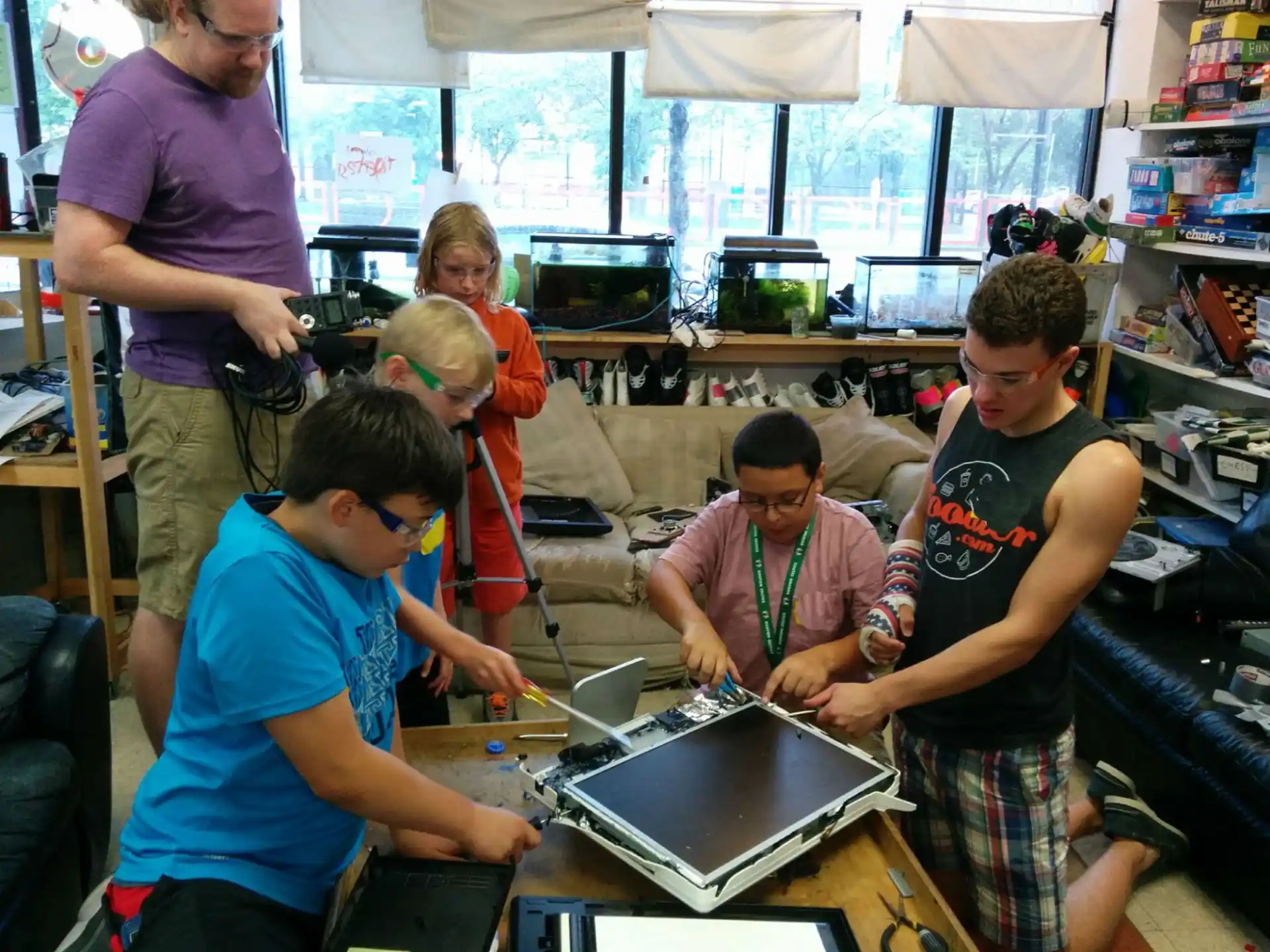 a group of people working on computers