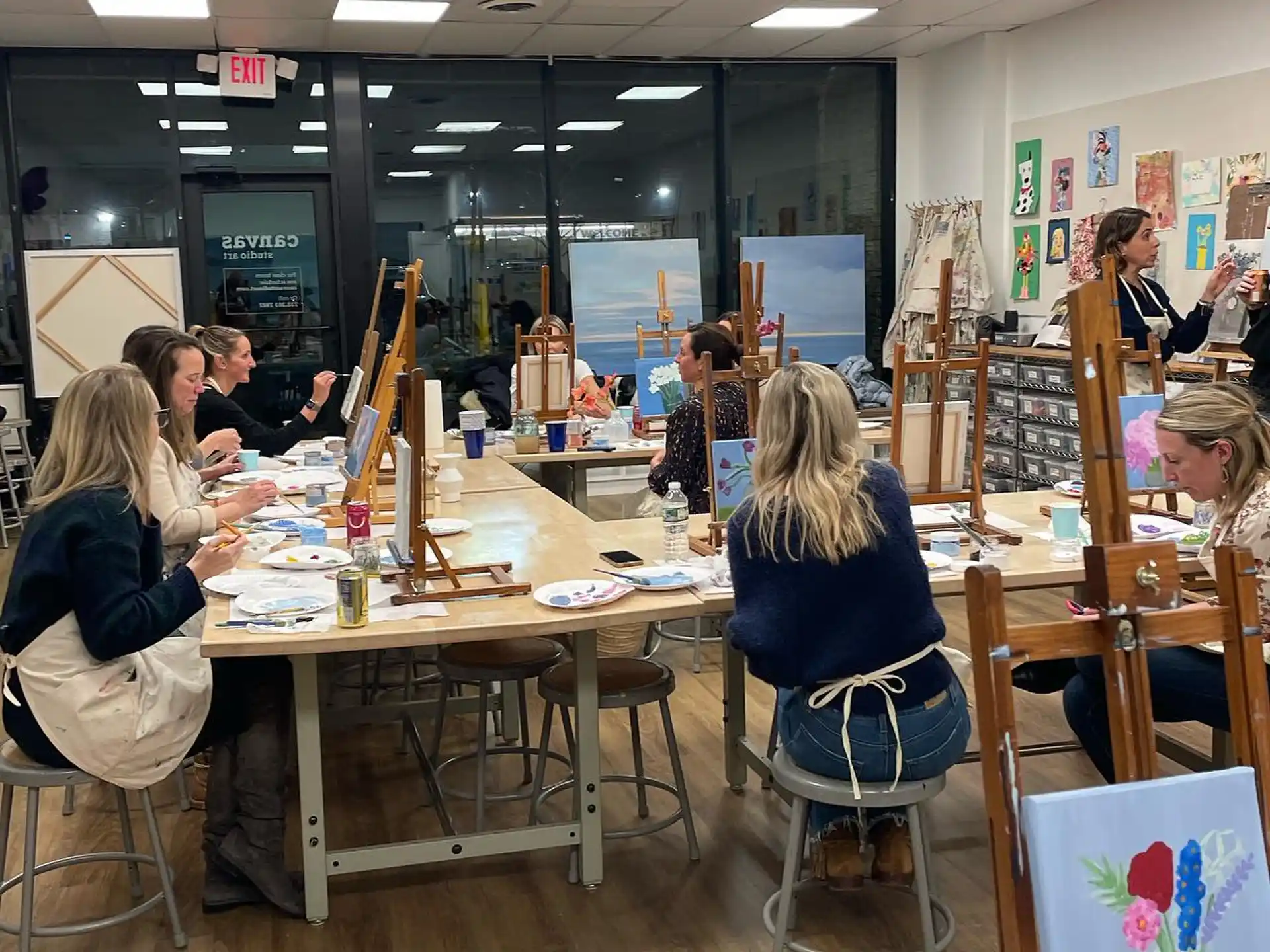 a group of people sitting at tables