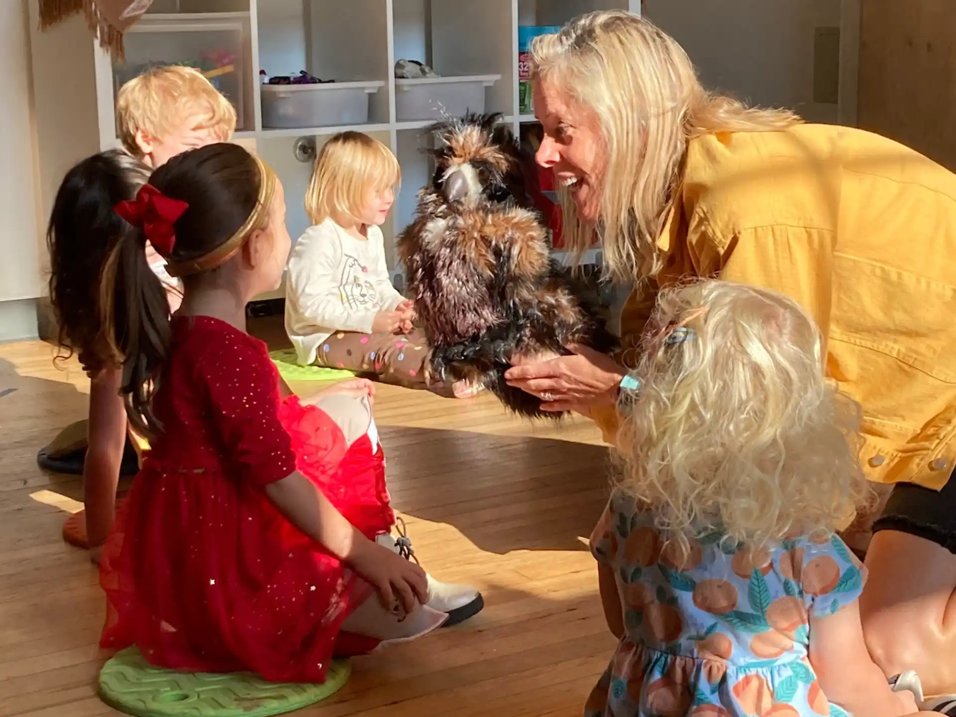 a person and a group of children