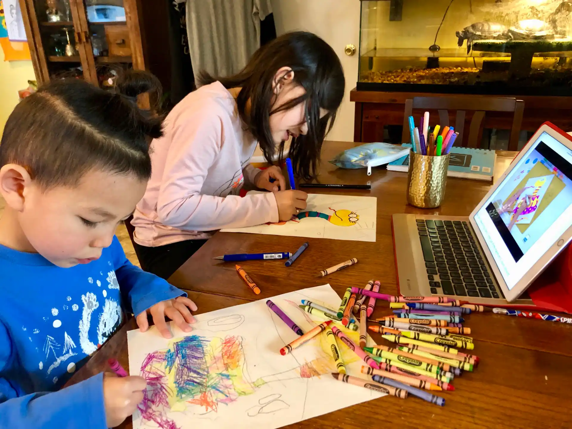 a person and a child painting