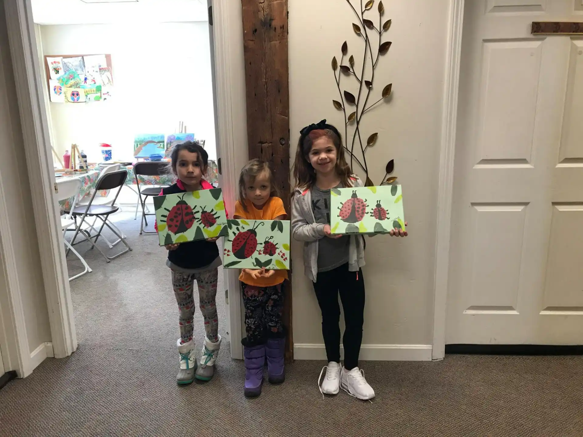 a group of girls holding signs