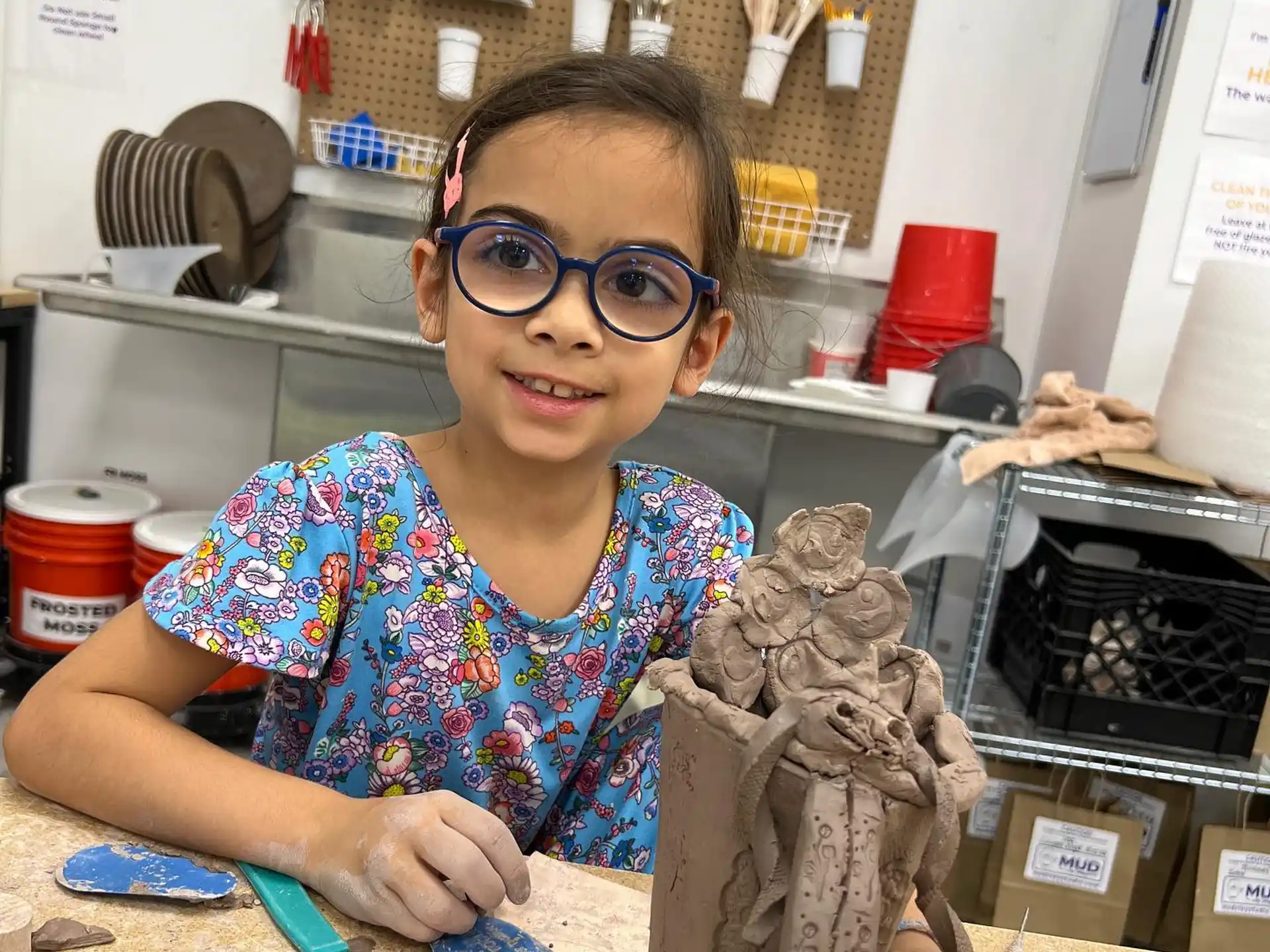 a girl wearing glasses