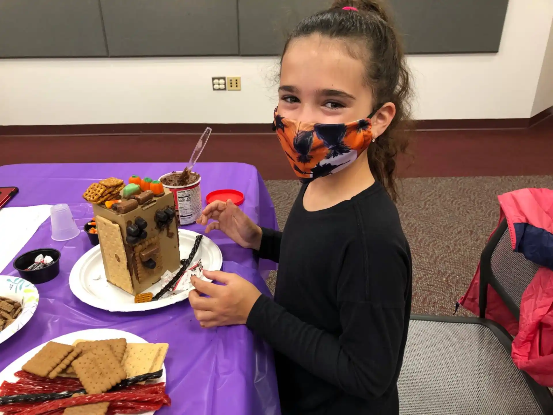 a girl with a mask on her face
