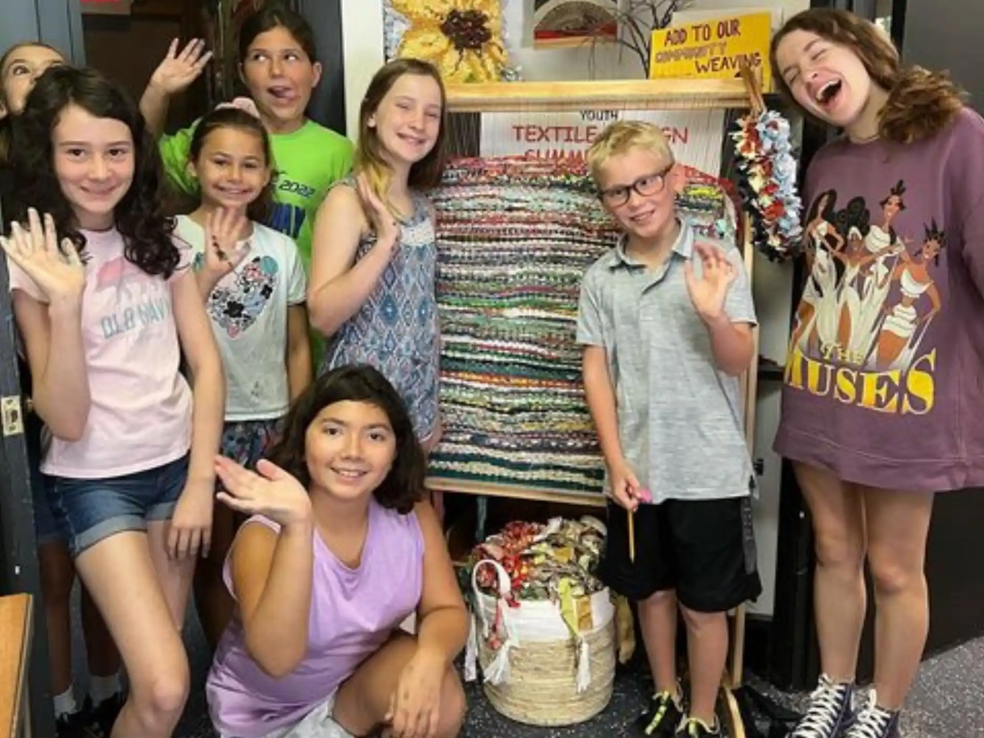 a group of children posing for a photo