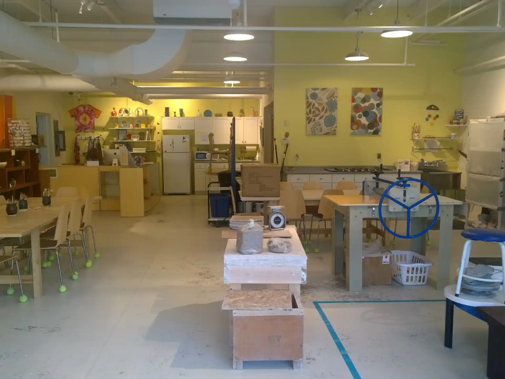 a room with tables and chairs