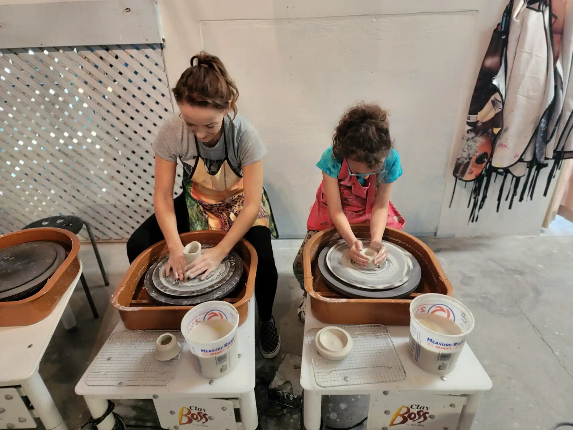 a couple of women working in a kitchen
