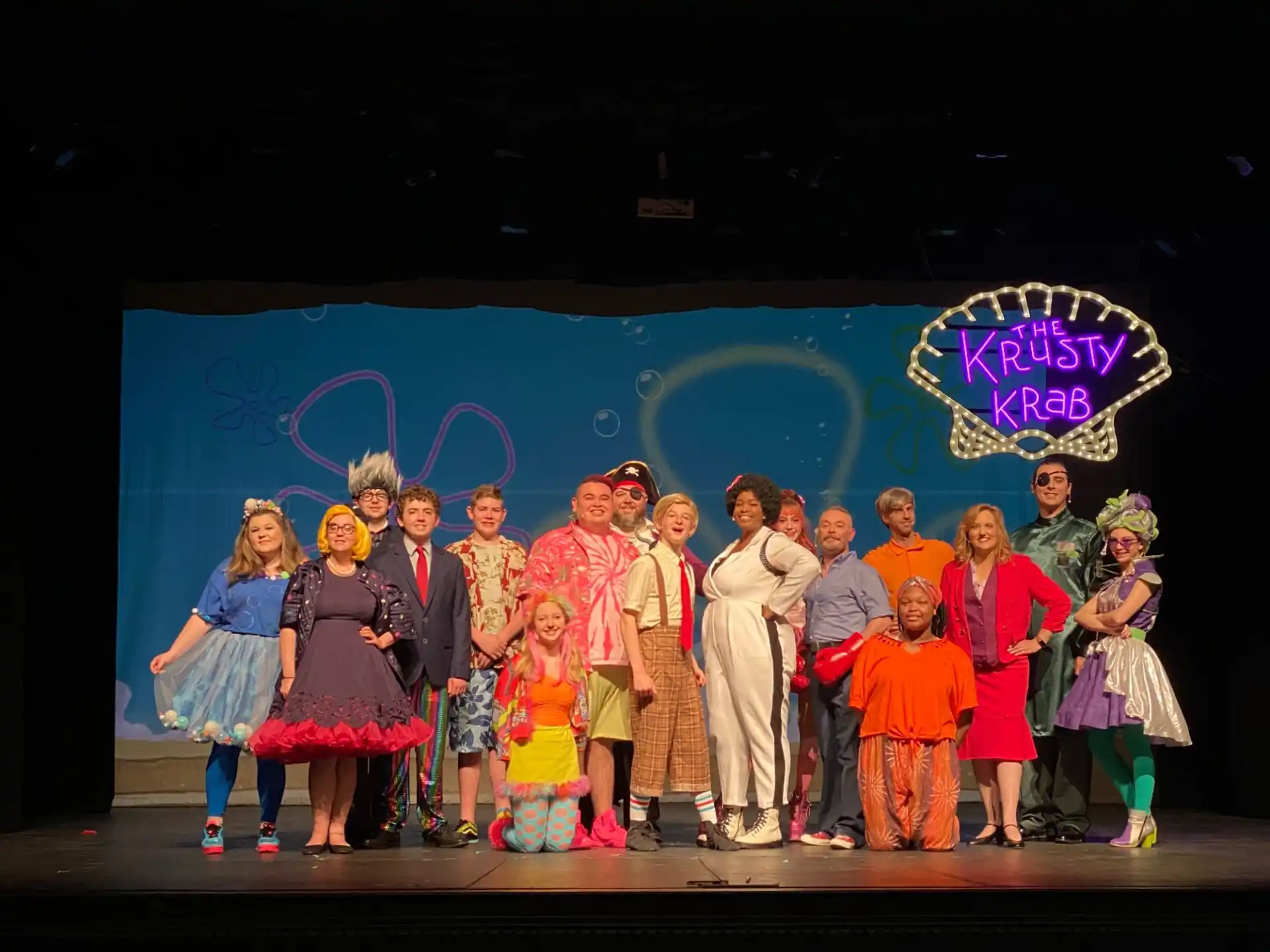 a group of people on a stage