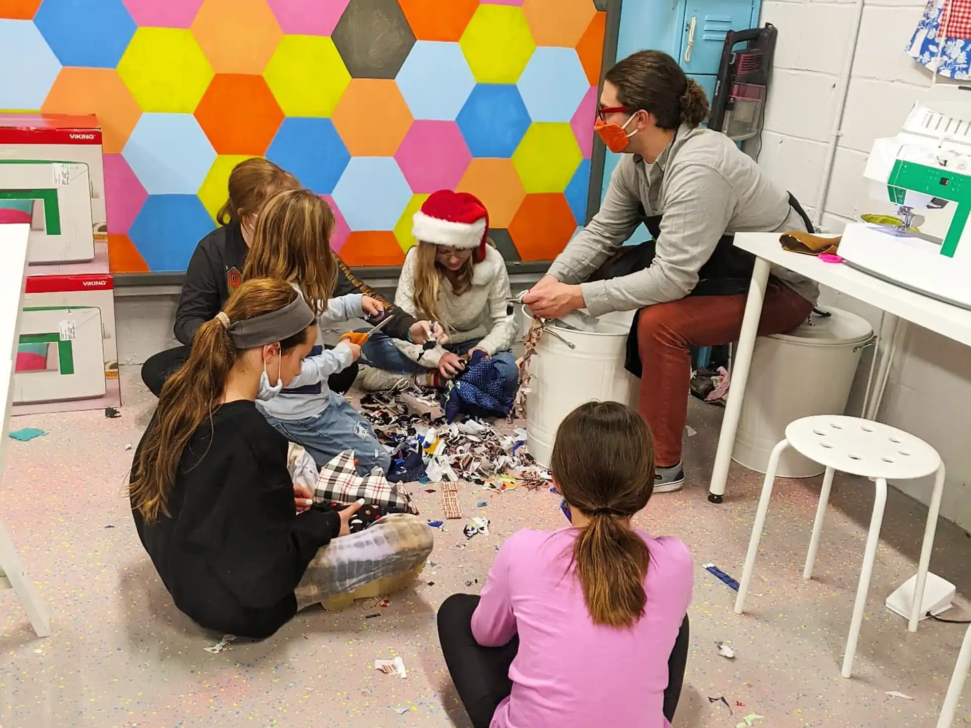 a group of people sitting in a classroom