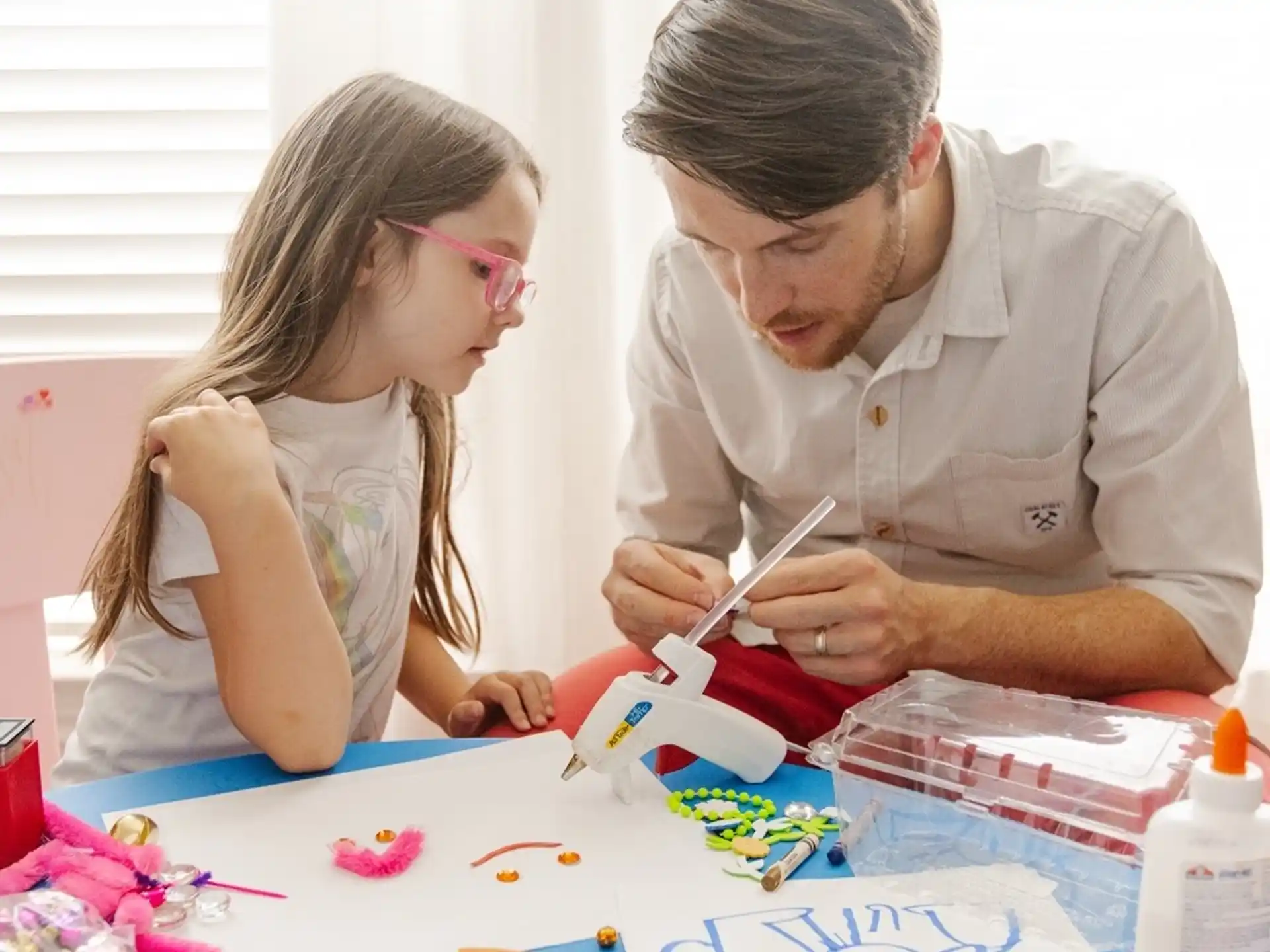 a person and a girl painting