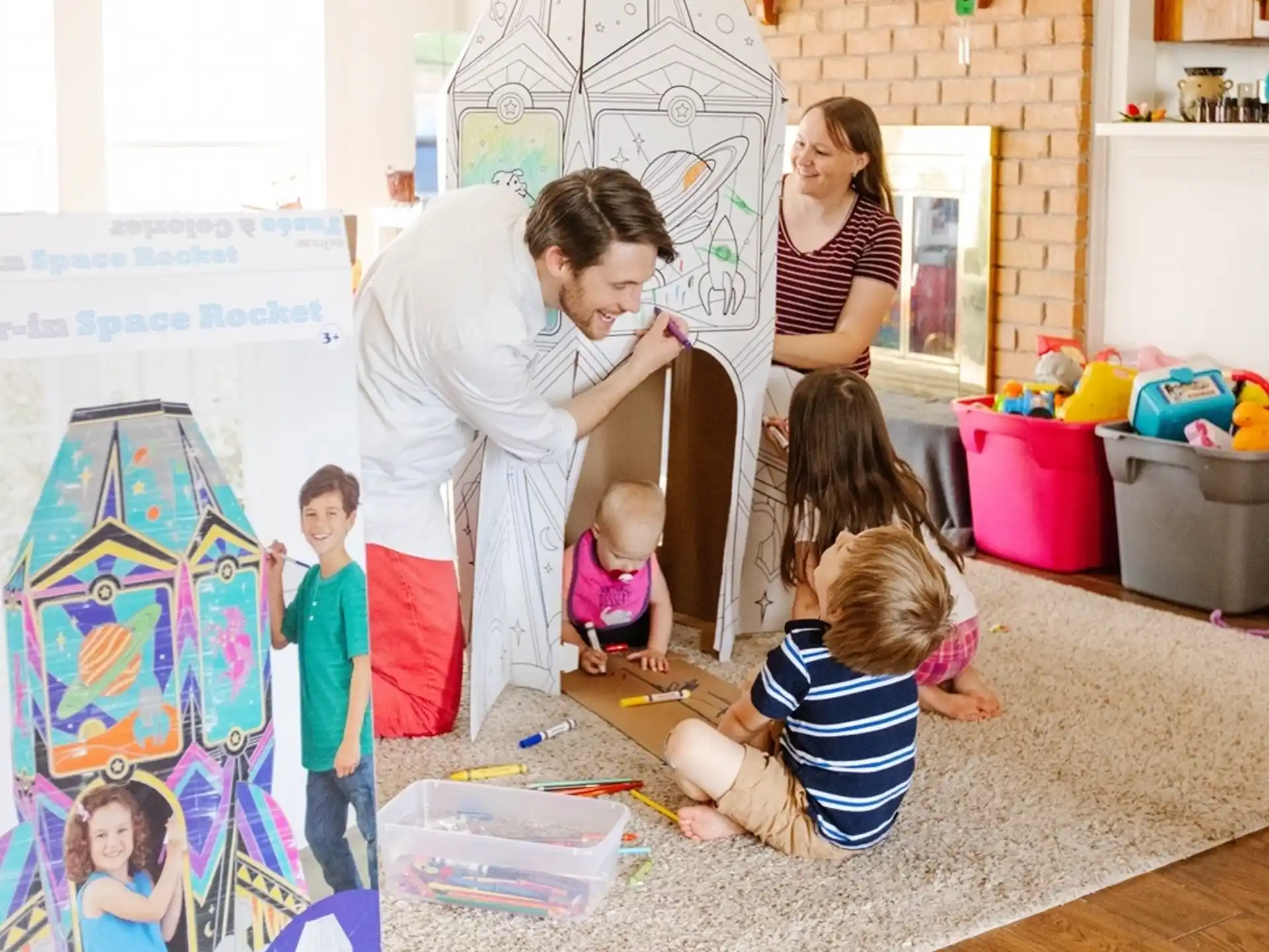 a person and children playing with toys