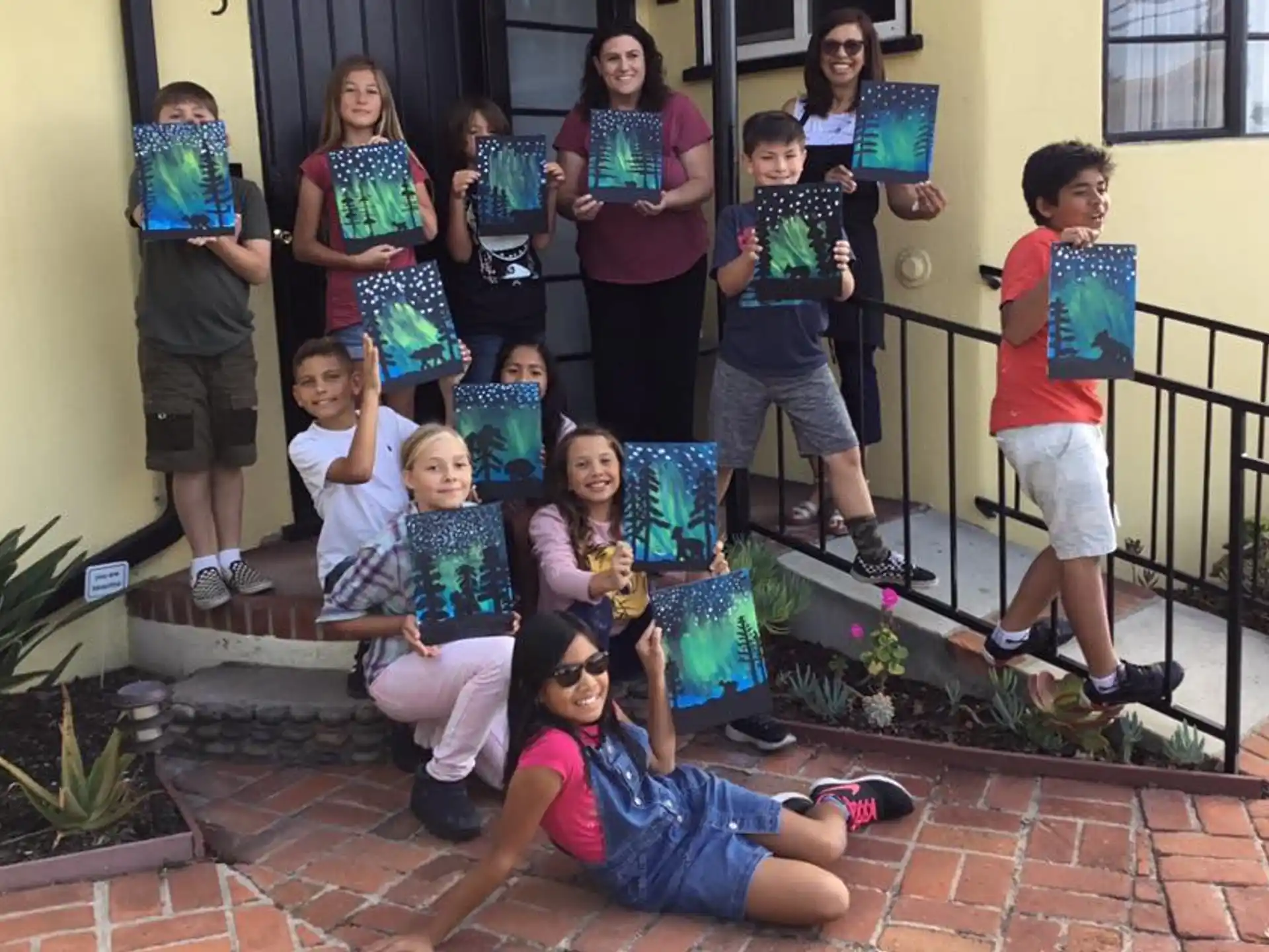 a group of children posing for a photo