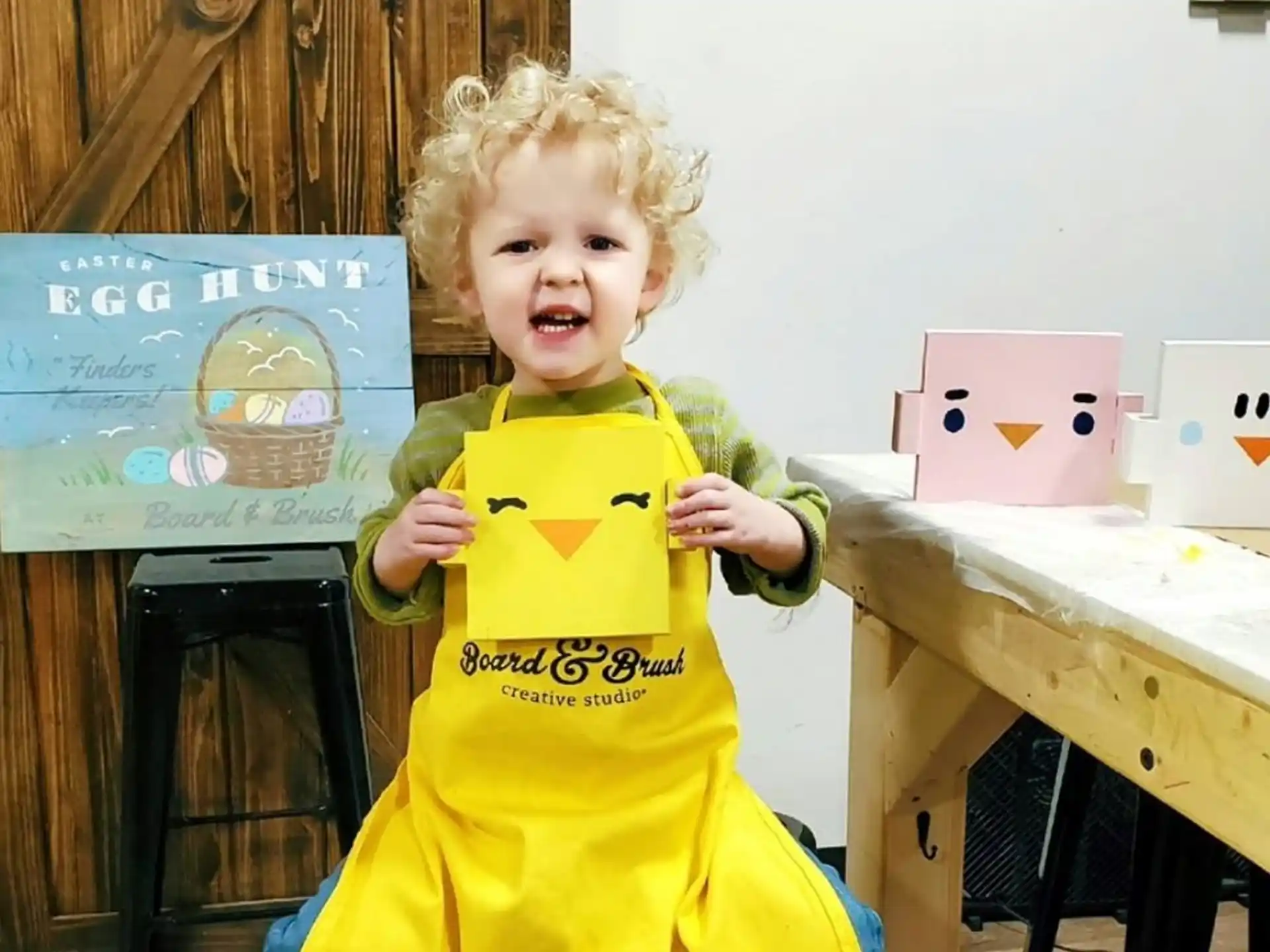a child holding a toy