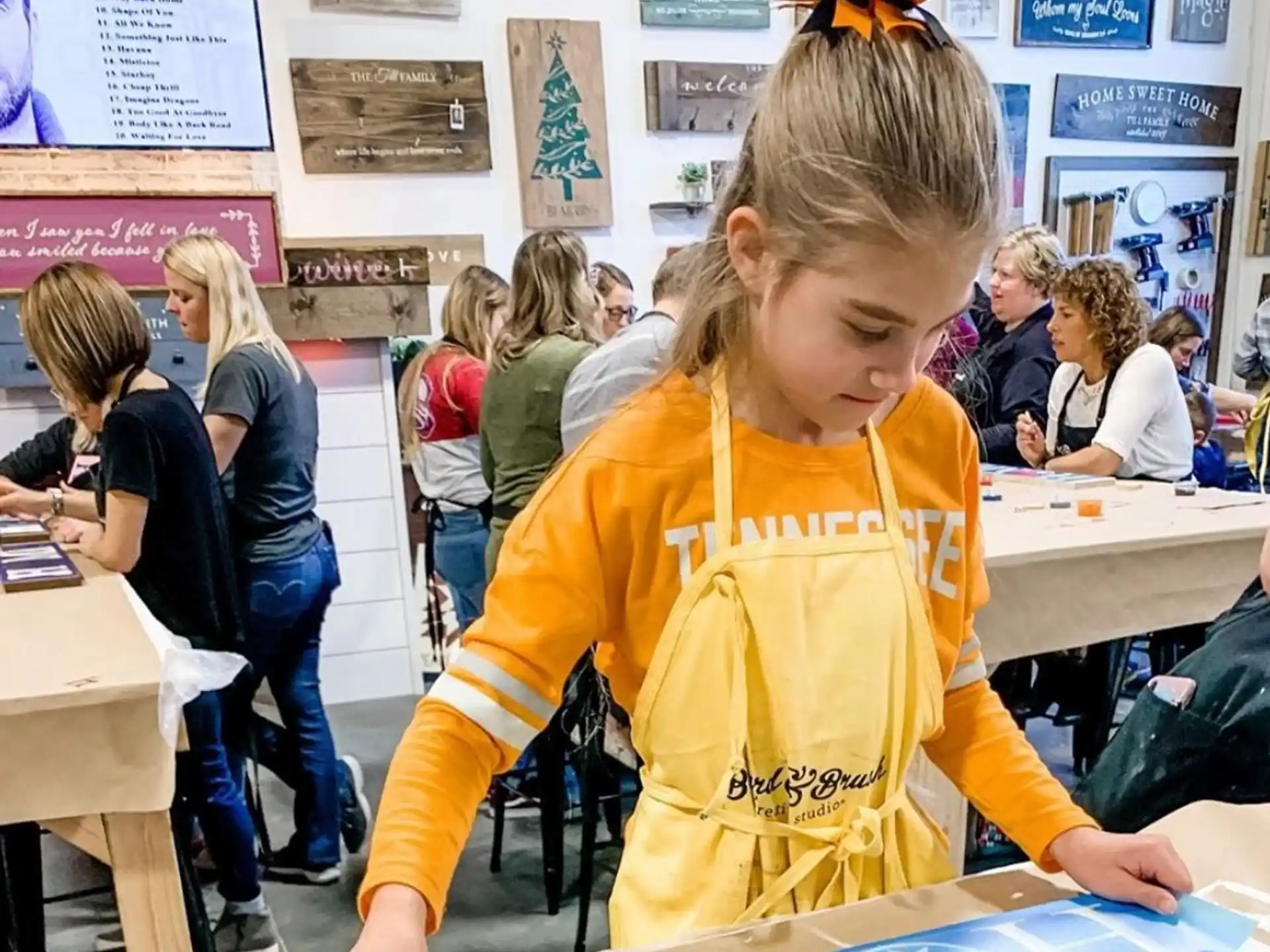 a girl in a yellow shirt