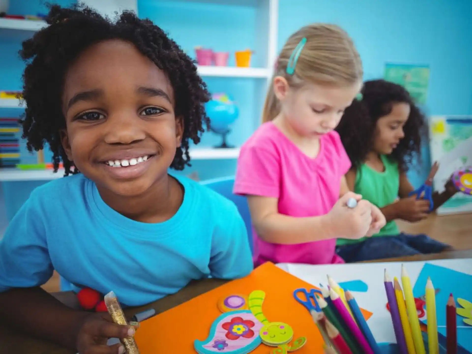 a young girl smiling