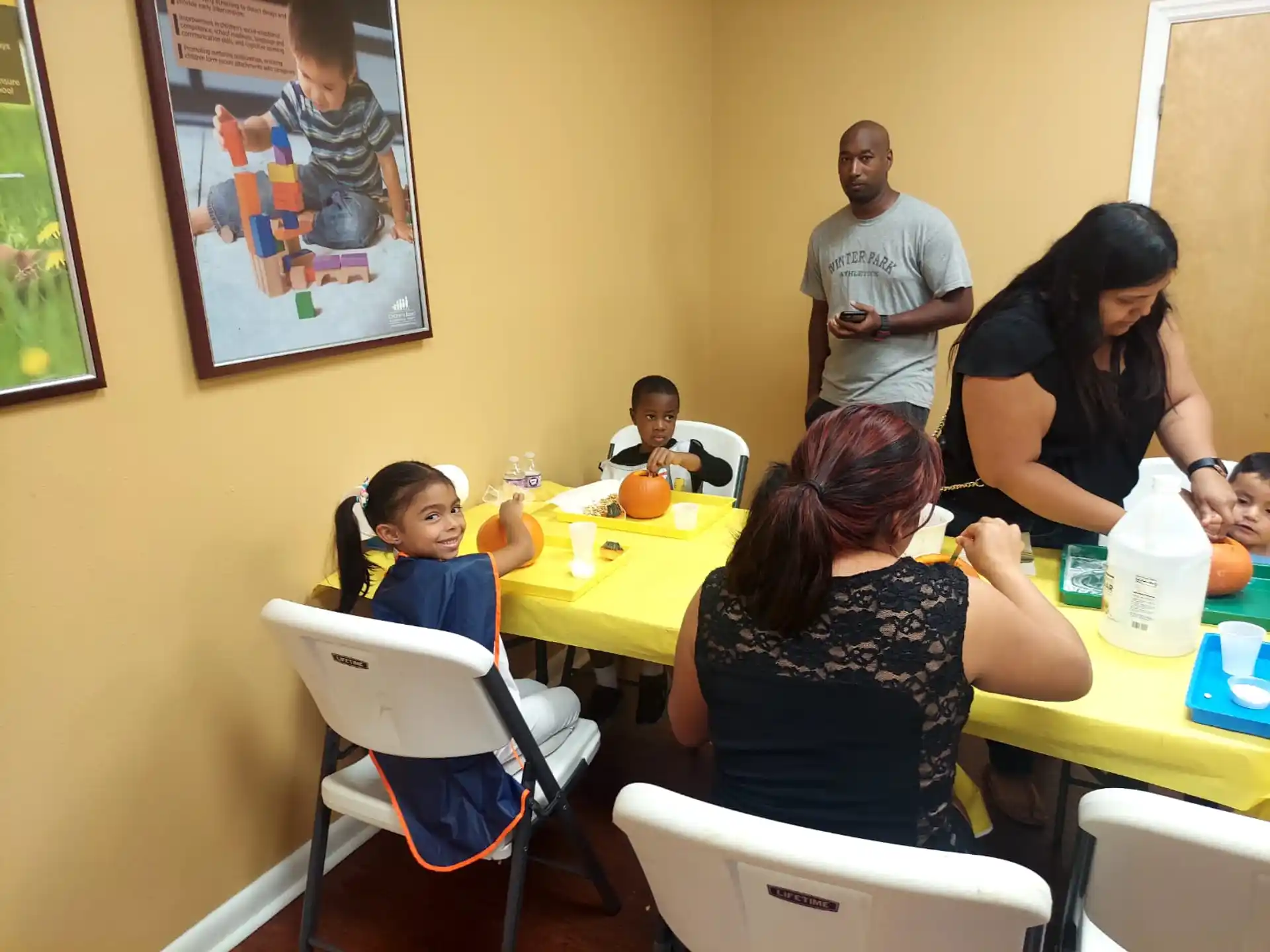 a group of people sitting at a table