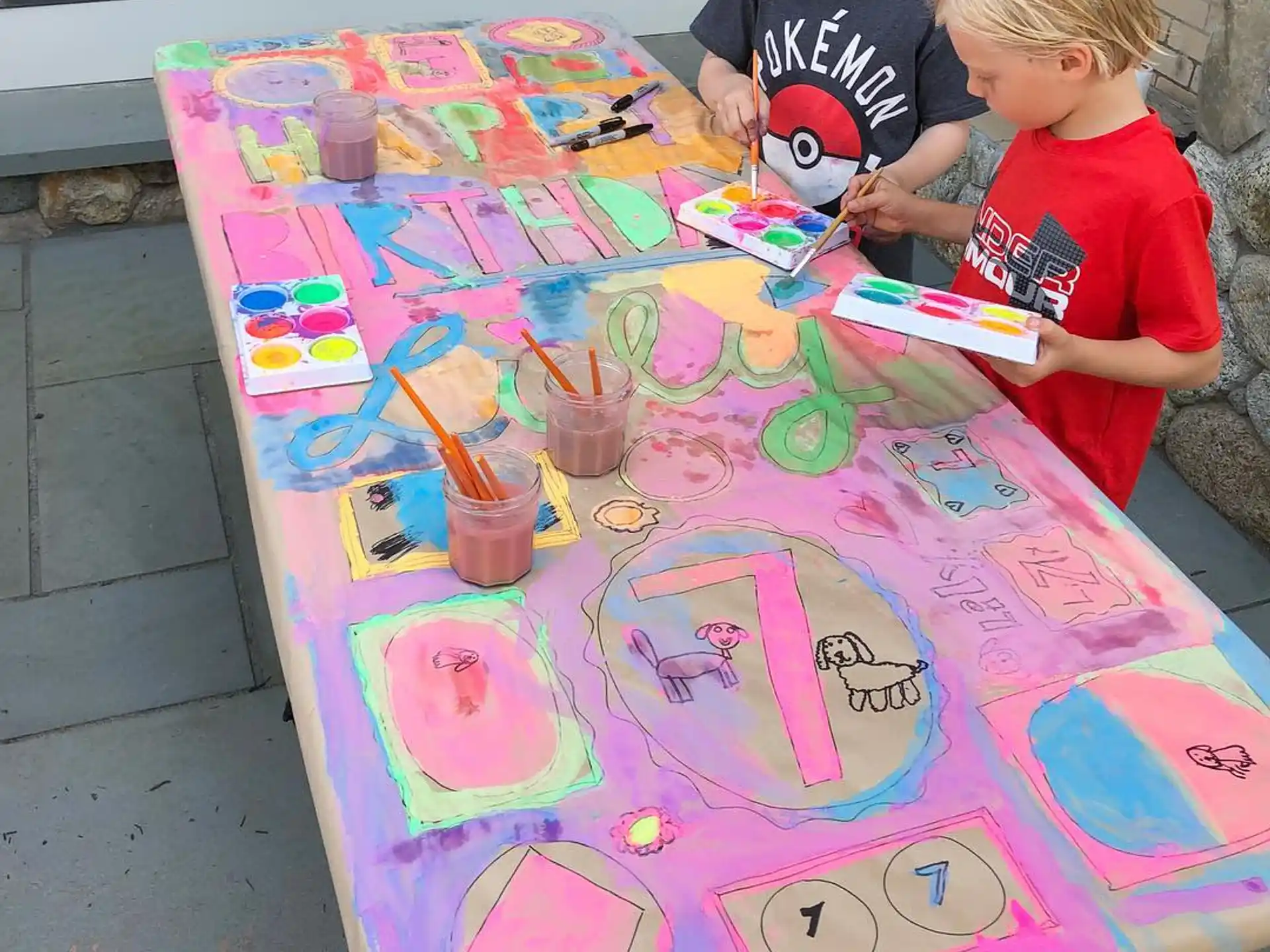 a couple of kids painting