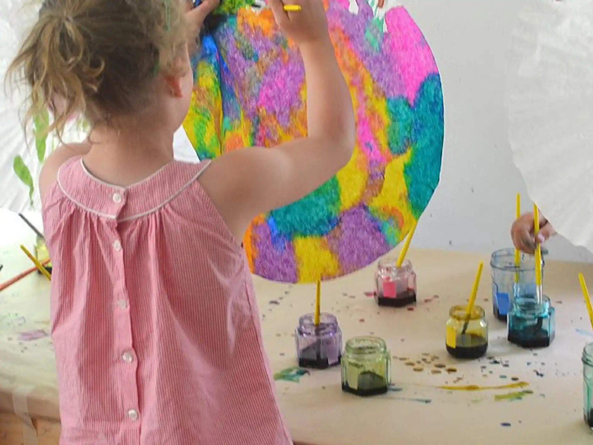 a young girl painting