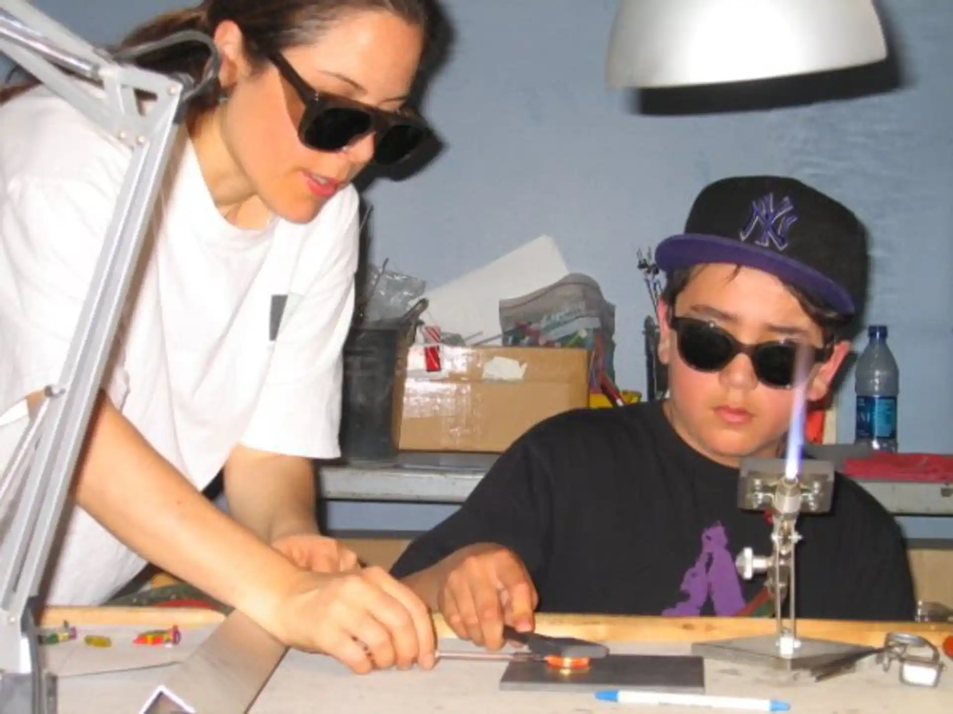 a person and a boy wearing sunglasses