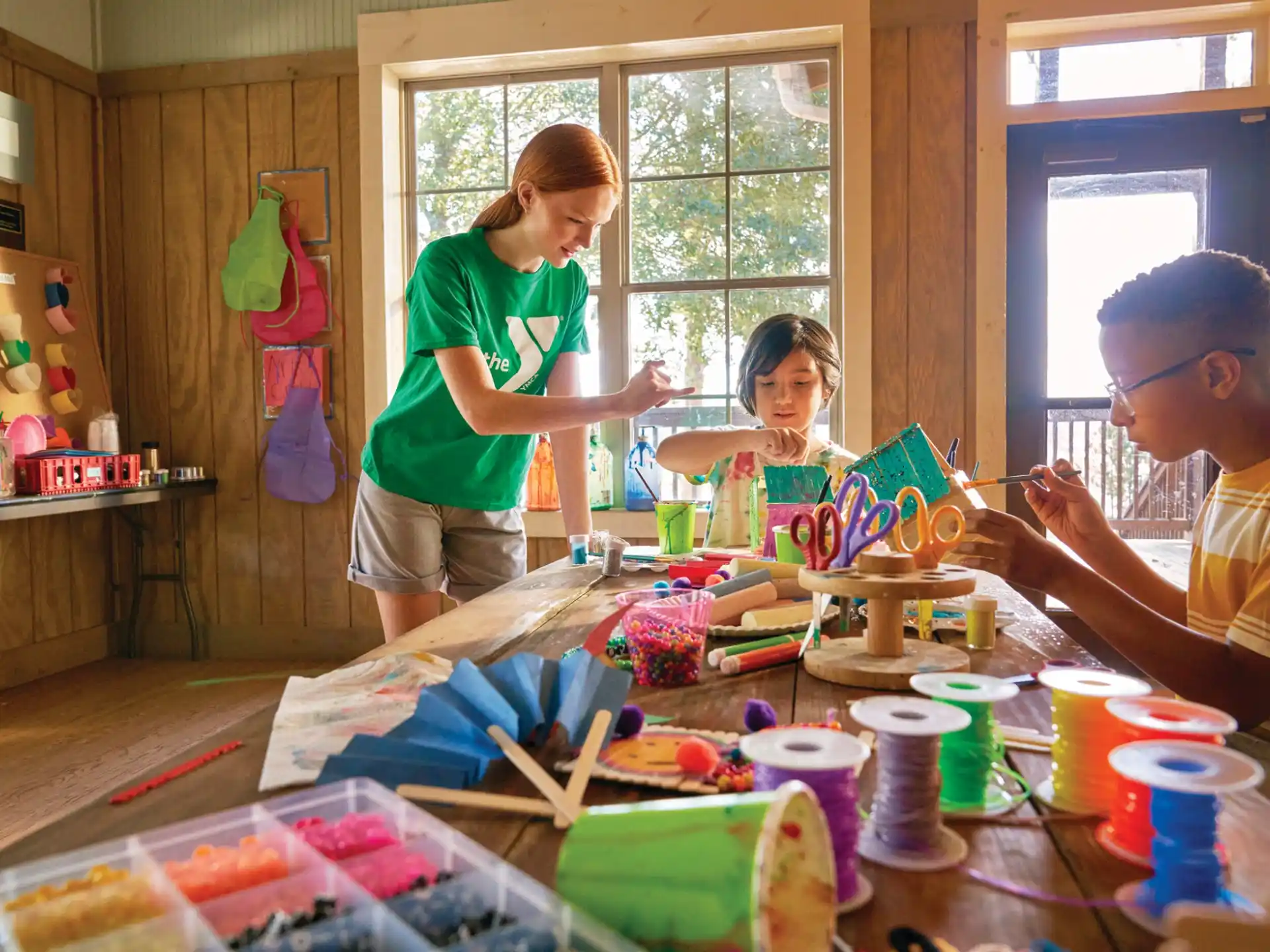 a group of people painting